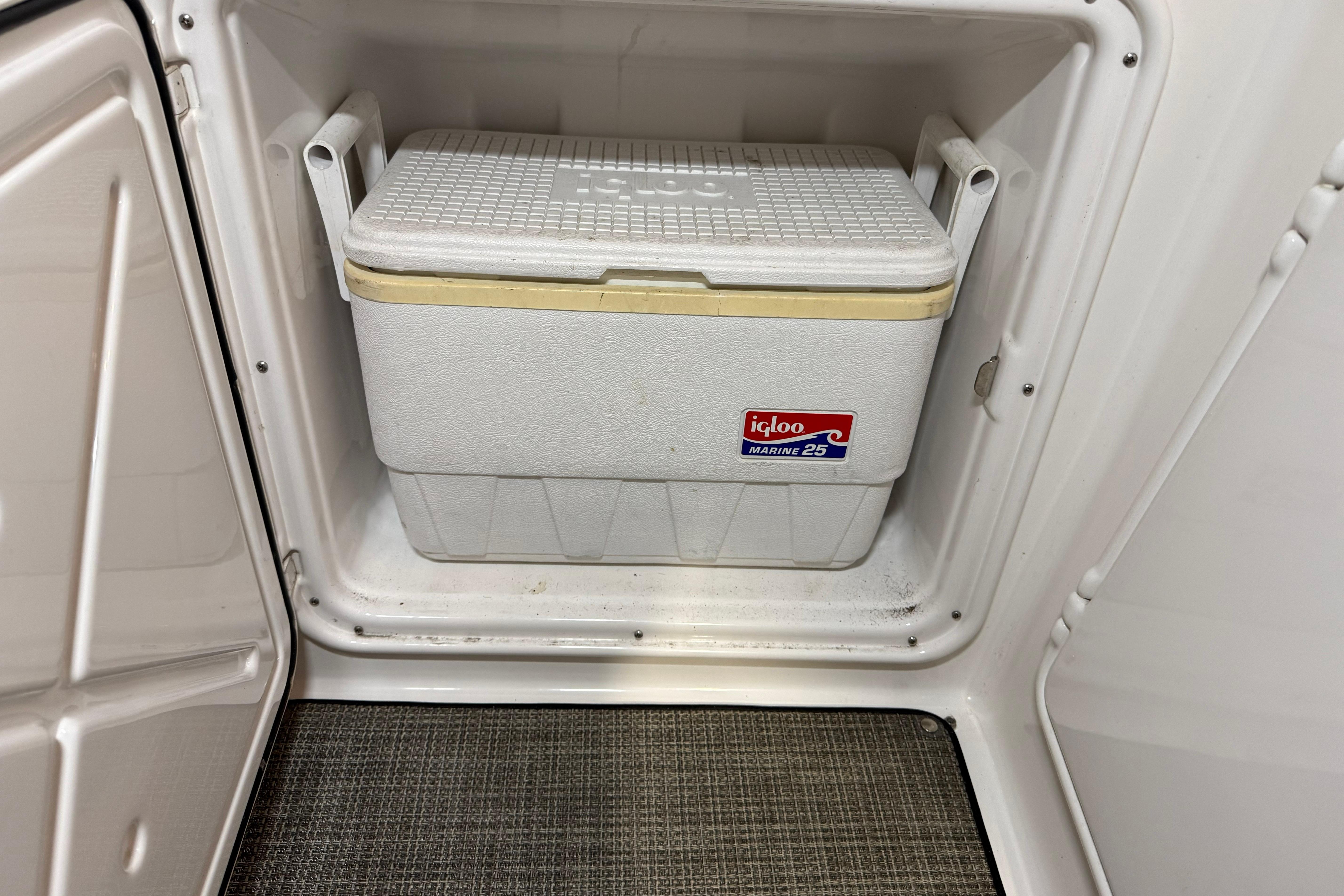 Igloo Marine 25 cooler inside 2007 Regal Commodore 3760 IO storage compartment.