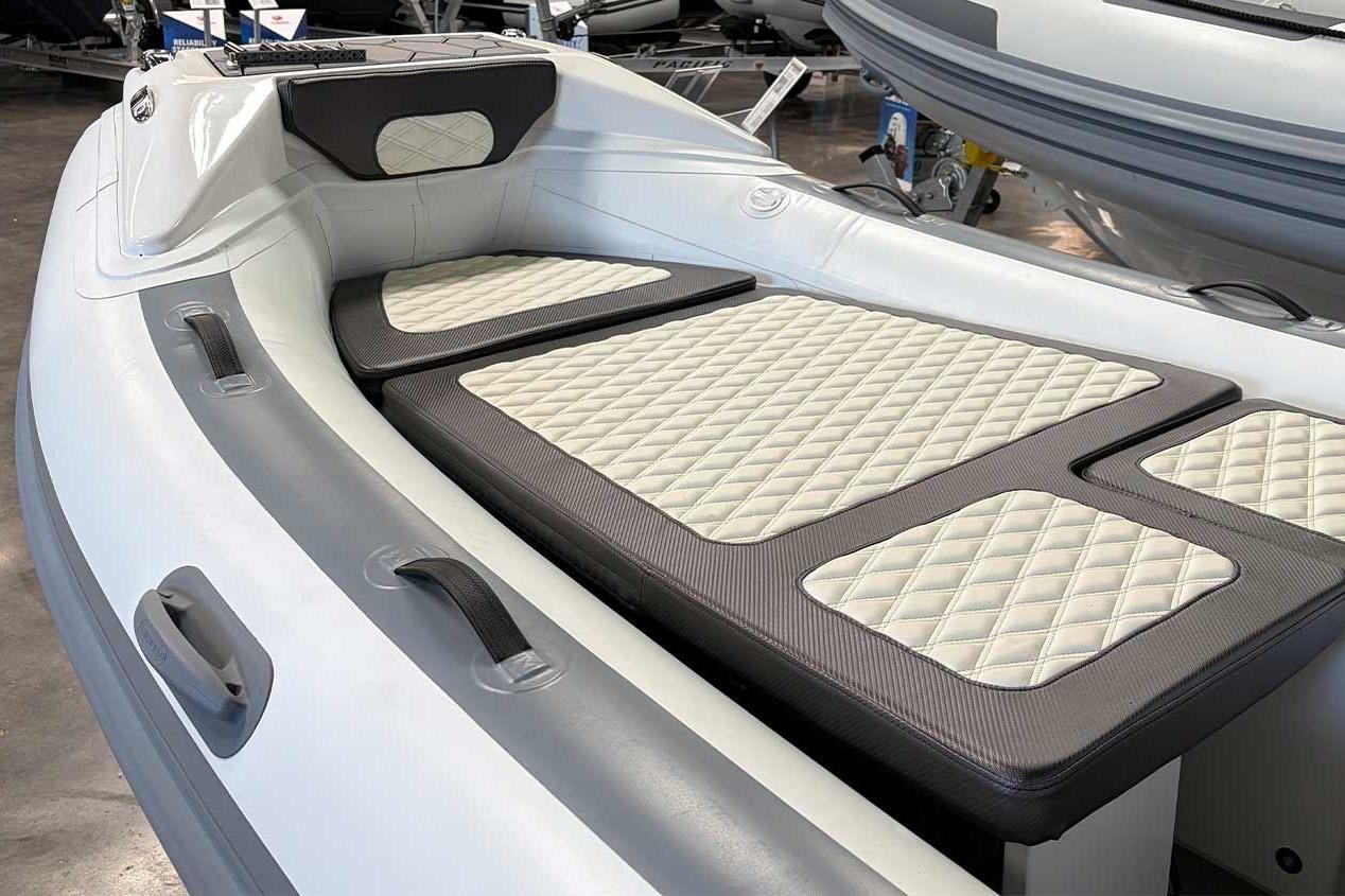 2026 Highfield Sport 460 boat interior with quilted seating and sleek design.