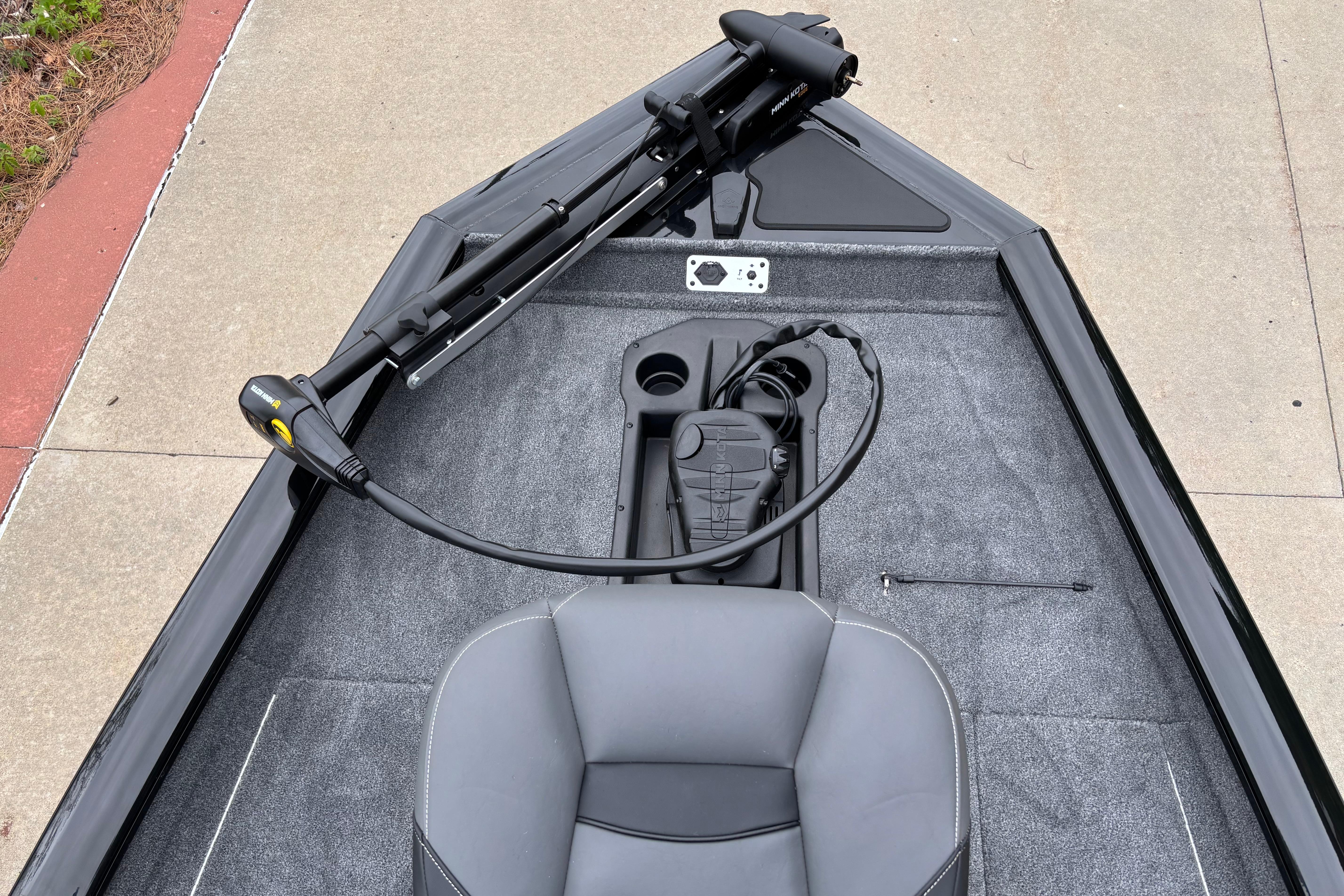 2026 Tracker Pro Team 175 boat interior with trolling motor and seating.
