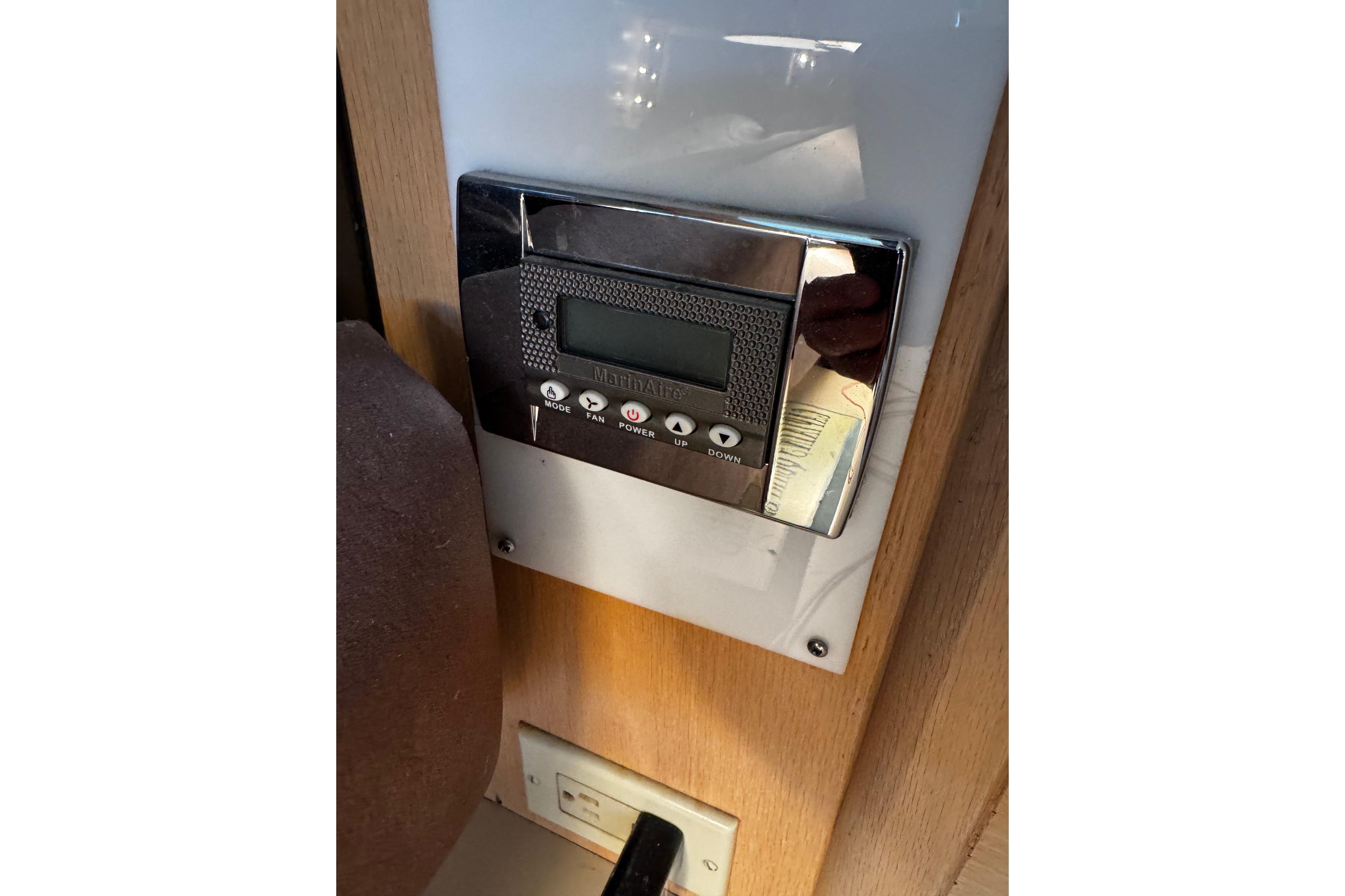 Digital control panel on 1991 Silverton 46 Motor Yacht interior.