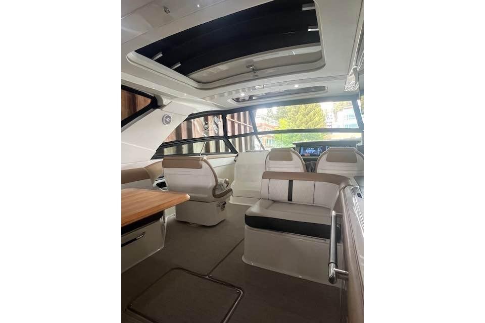 Interior of 2018 Sea Ray SLX 400 boat with modern seating and sleek design.