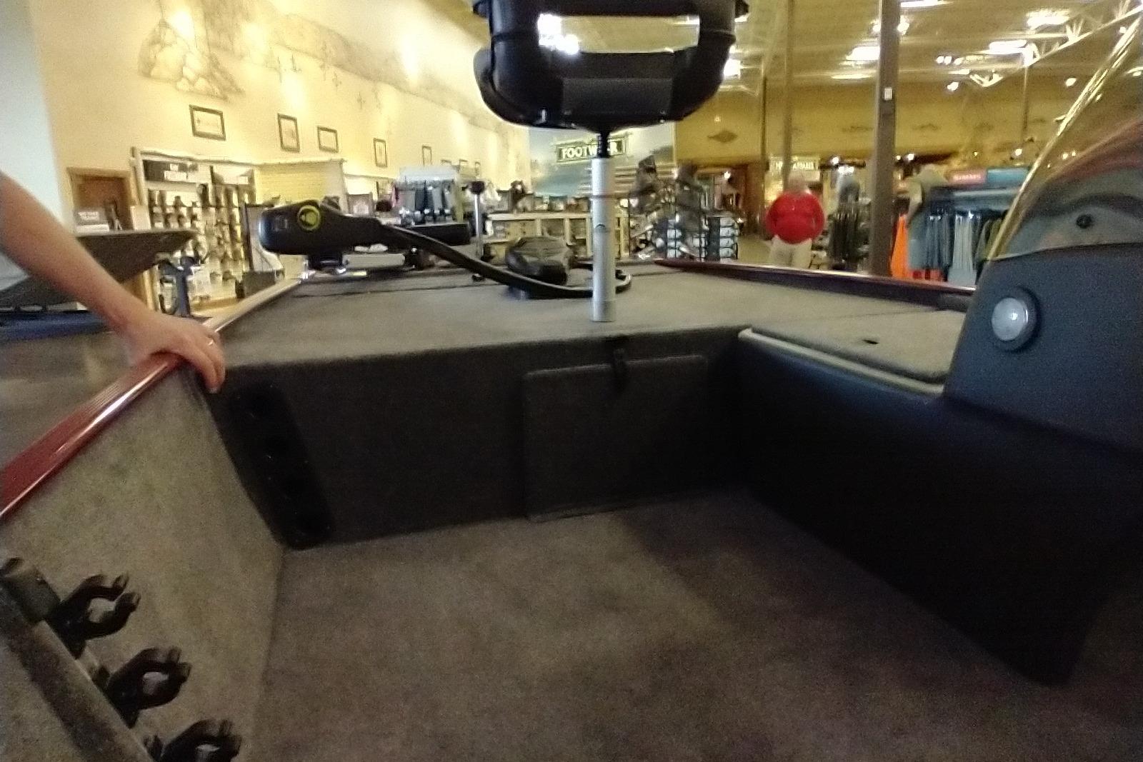 Interior view of 2026 Tracker Bass Tracker Classic XL boat in showroom.