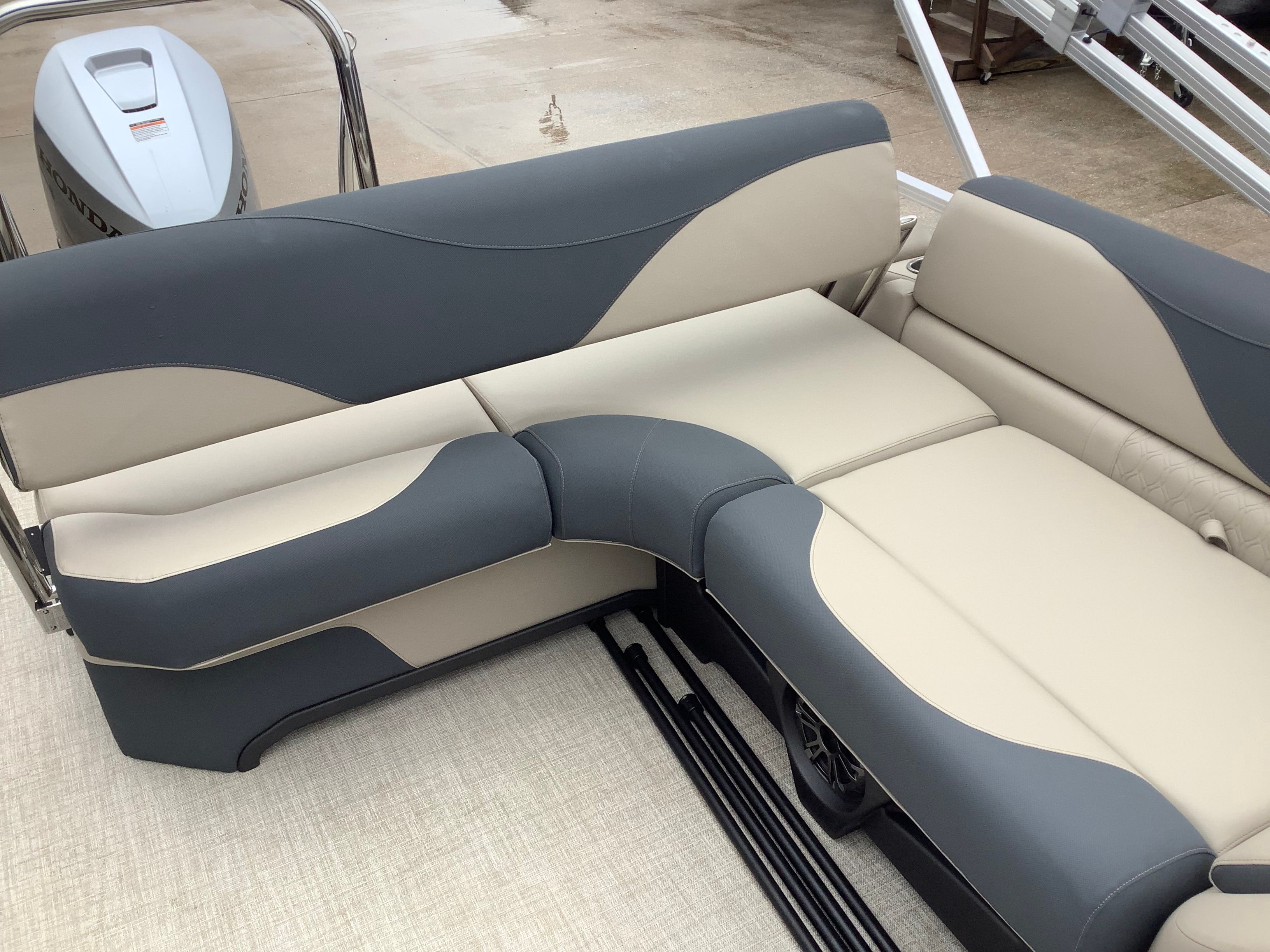 2026 Tahoe 2185 LTZ pontoon boat with gray and beige seating.
