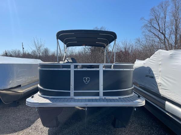 2025 Armada Saphir 23CR pontoon boat with canopy, parked outdoors.