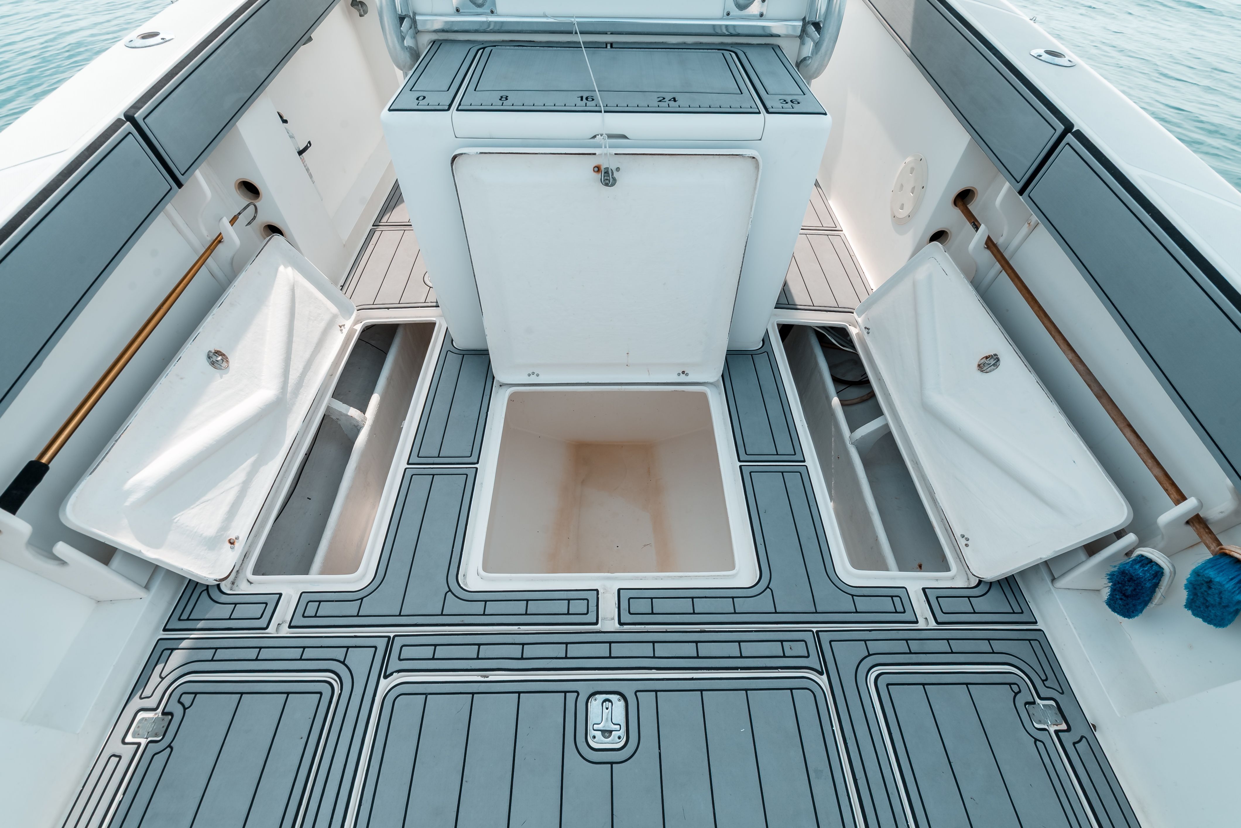 Deck layout of the 2006 Tempest Offshore 40 with storage and seating areas.