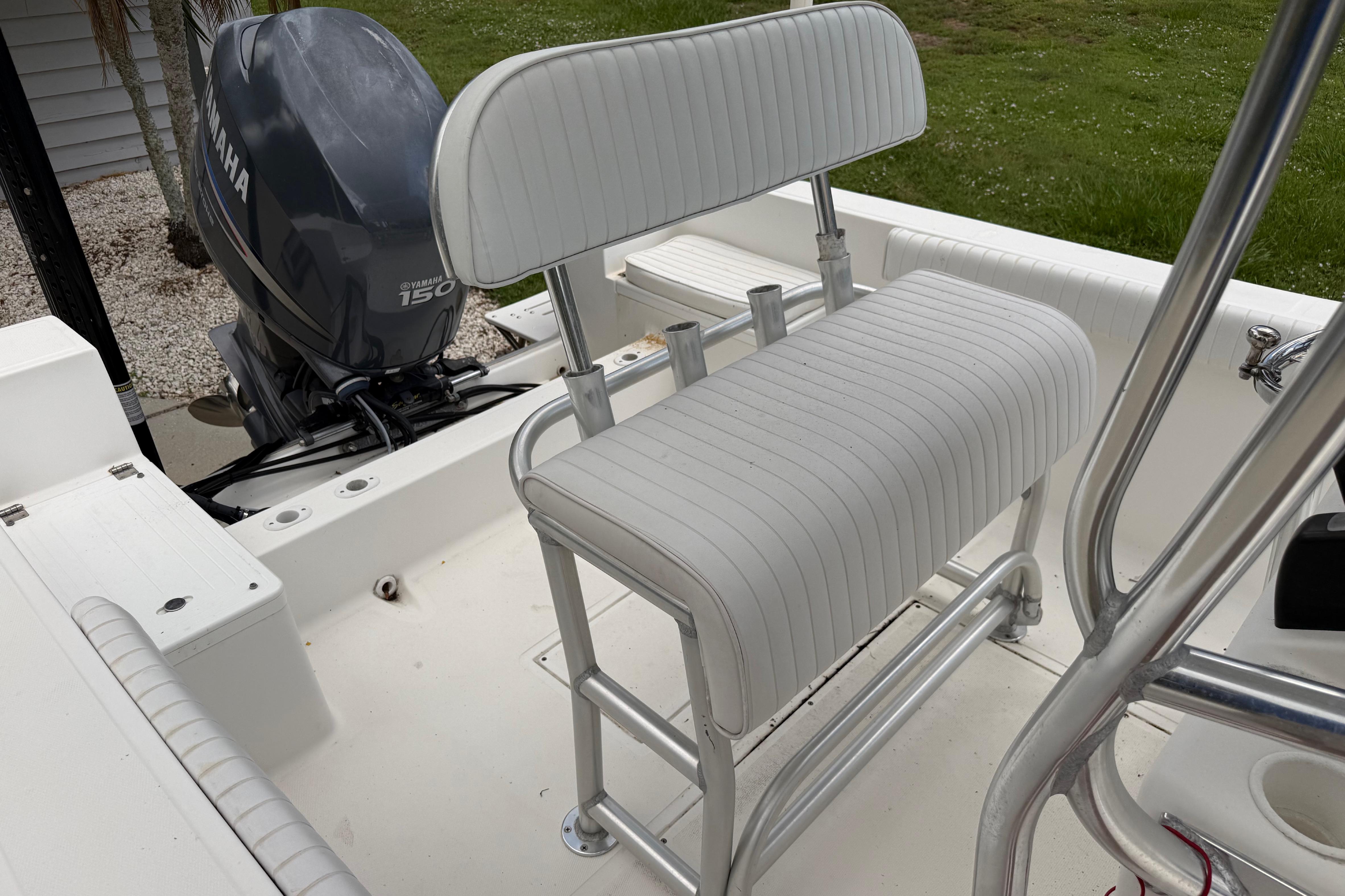 2012 Clearwater 2000 Center Console boat interior with Yamaha 150 engine and white seating.