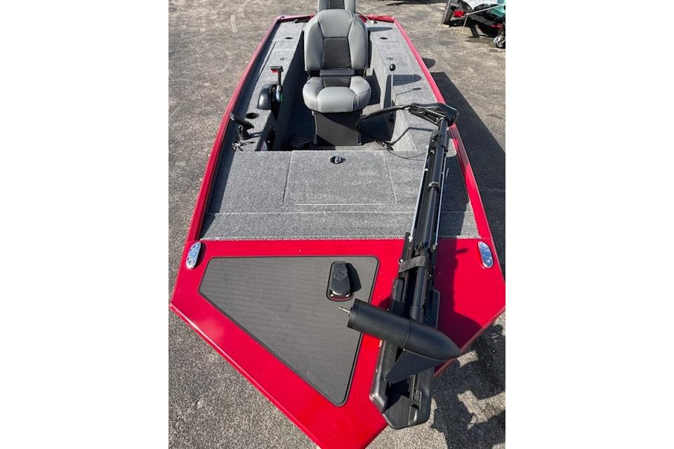 2025 Tracker Panfish 17 boat with red exterior and gray seating, viewed from above.