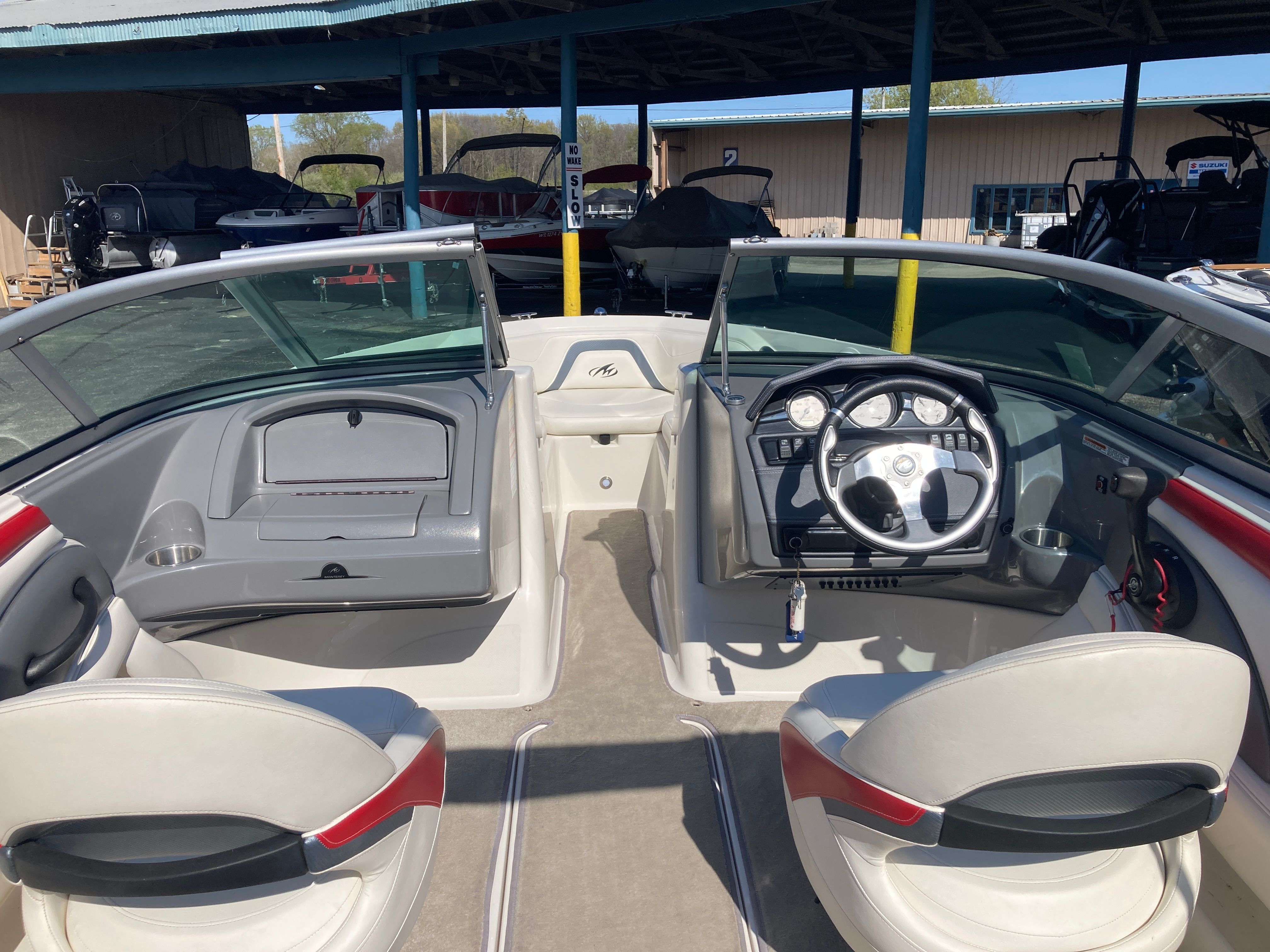 Interior of a 2012 Monterey 204FS boat with steering console.