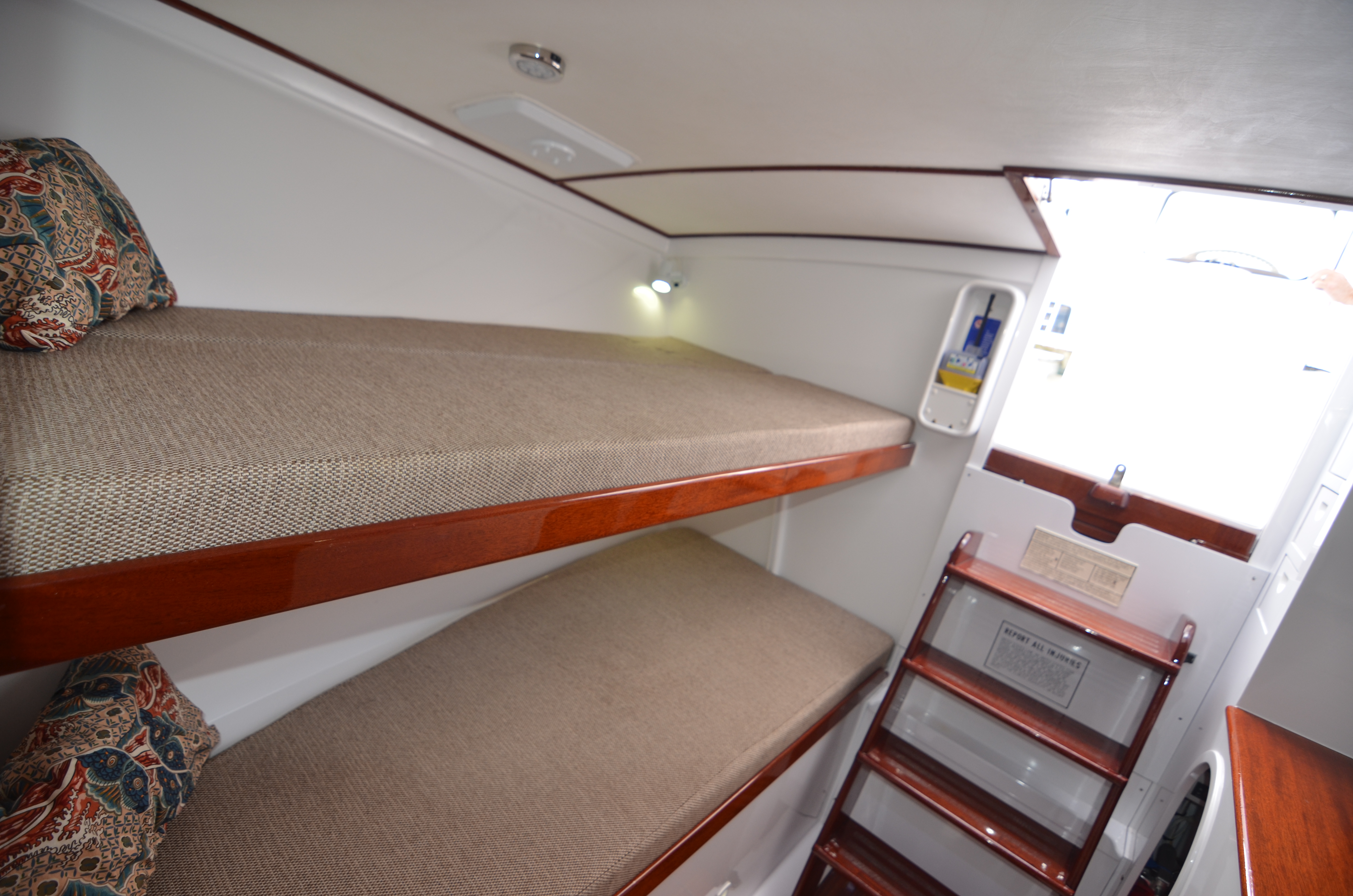 Interior of 1993 Gamefisherman Open with bunk beds.