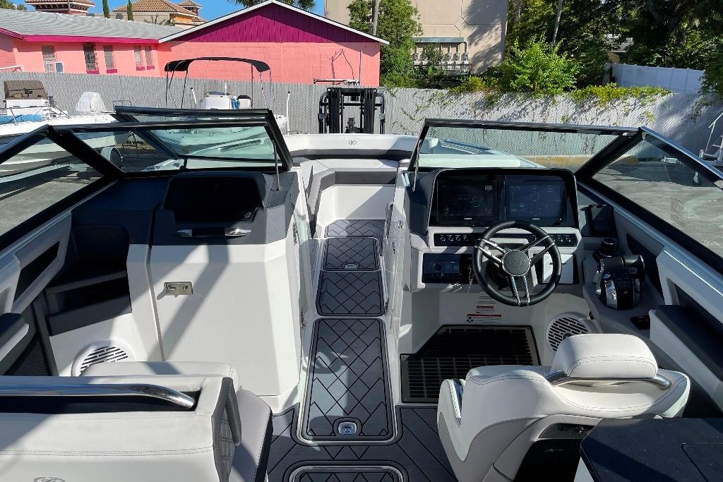 Interior view of a 2022 Cobalt R8 Outboard boat with modern dashboard and seating.