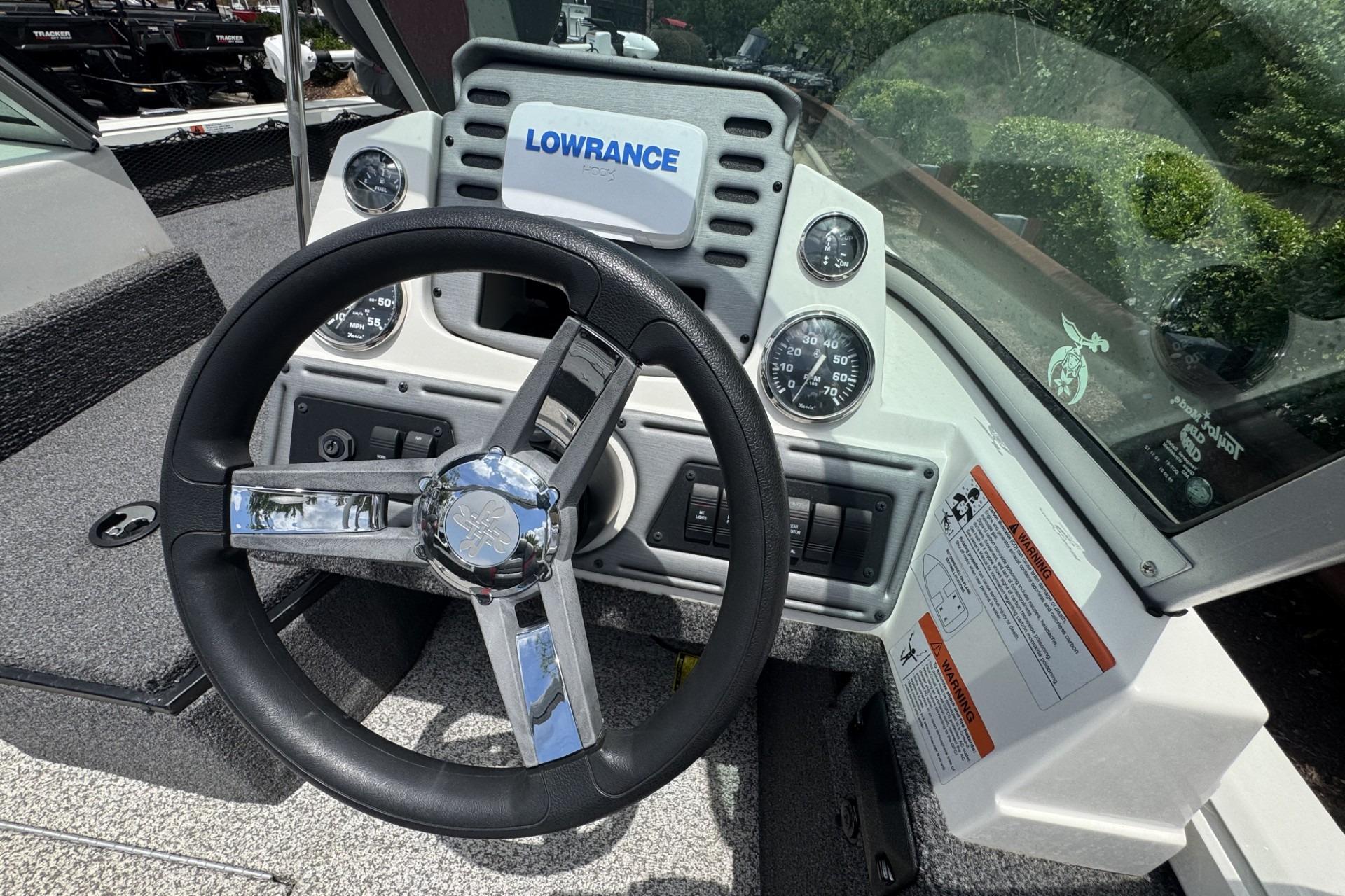 2020 Ranger VS1682 WT boat dashboard with steering wheel and Lowrance display.