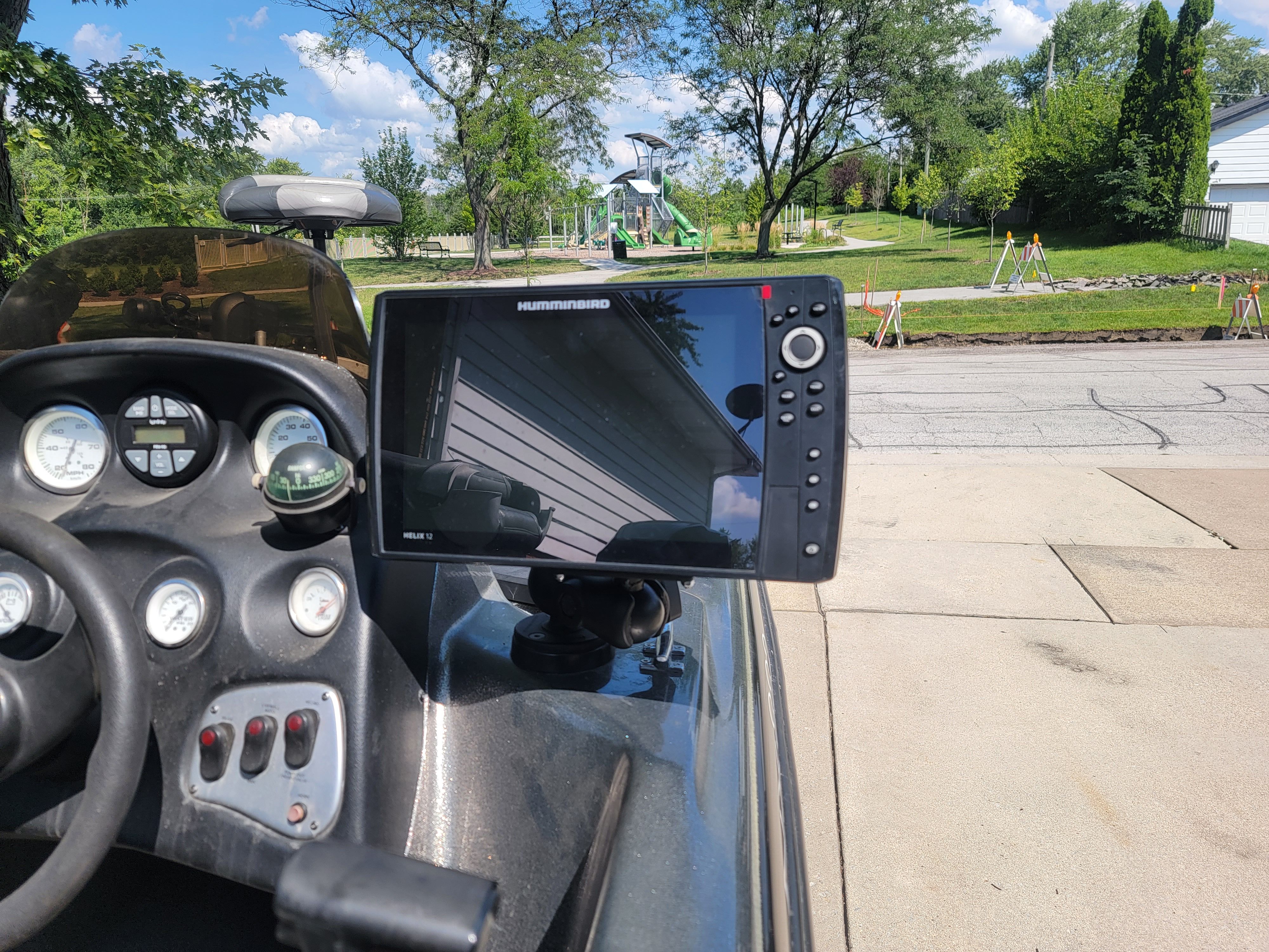 A 2004 Nitro NX 882 SC with a modern navigation system on the dashboard.