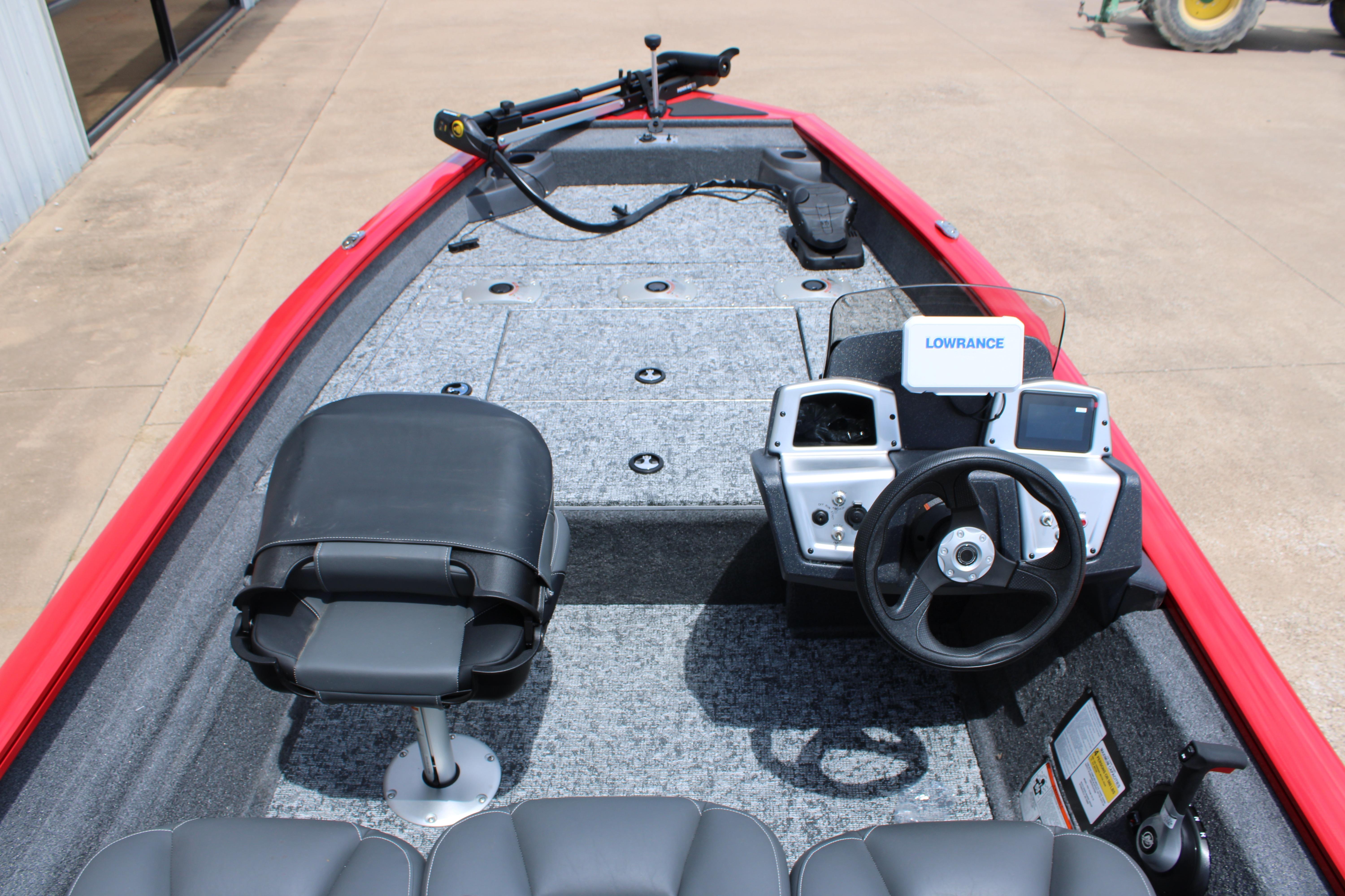 2026 Tracker Pro Team 175 Crappie Edition boat interior with steering wheel and Lowrance electronics.