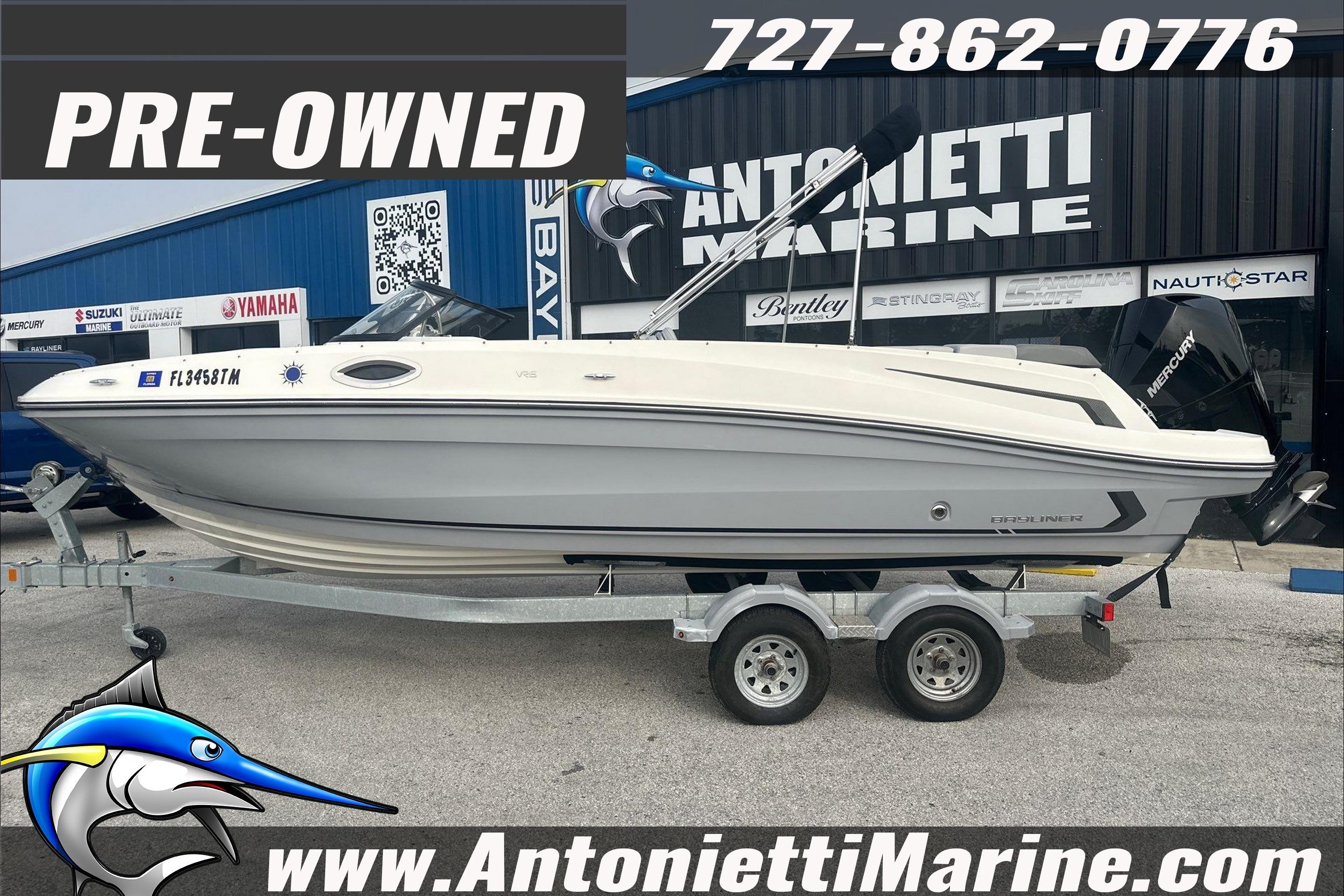 Pre-owned 2022 Bayliner VR6 Bowrider OB on trailer at Antonietti Marine dealership.