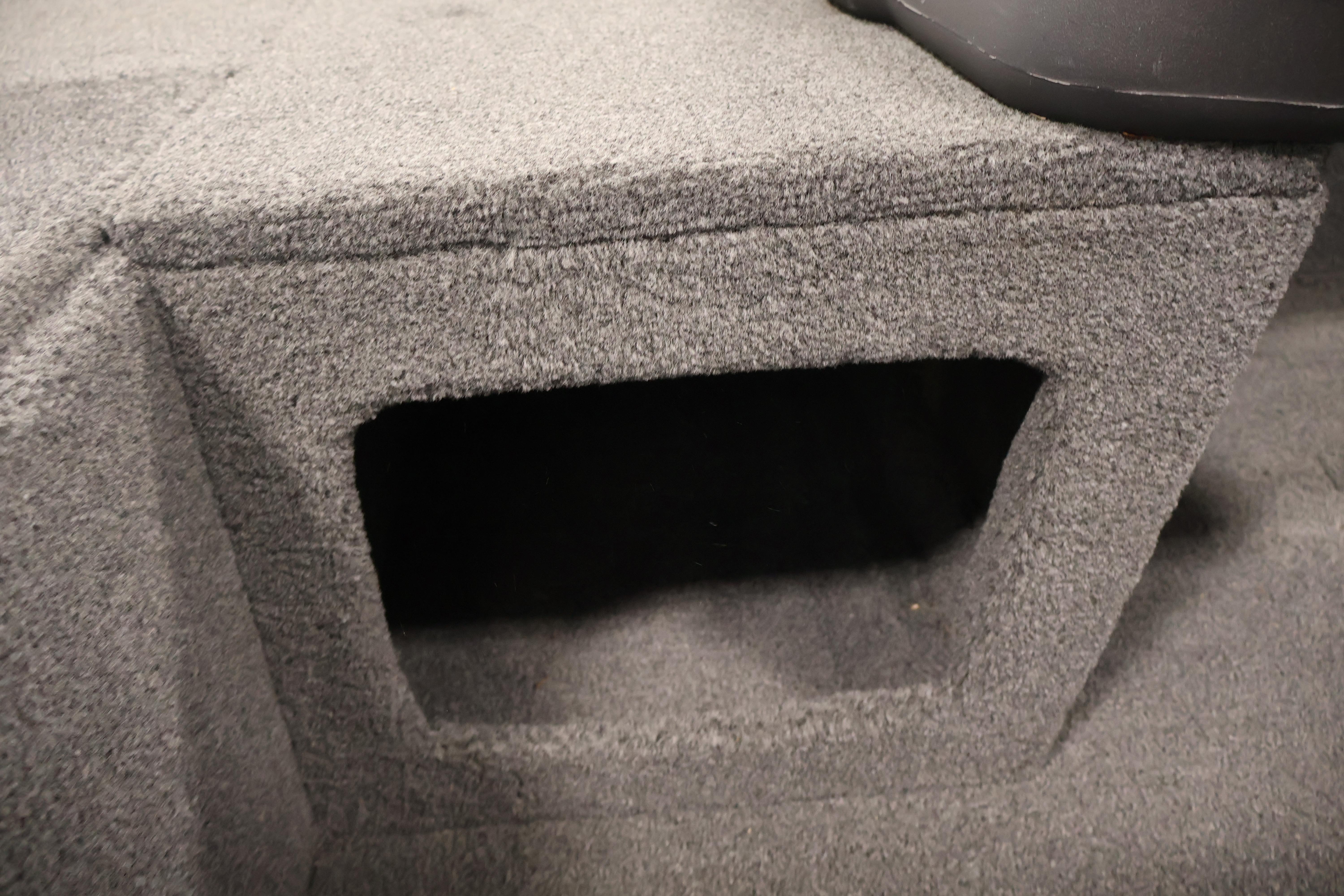 Carpeted storage compartment in 2024 Tracker Pro 170 boat interior.