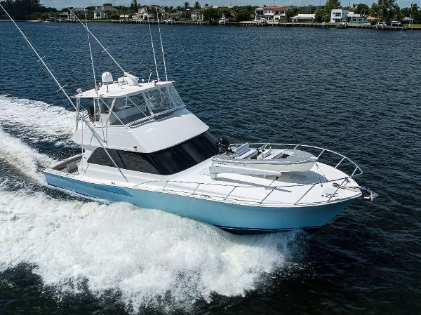 2000 Viking 50 Convertible yacht cruising on open water.