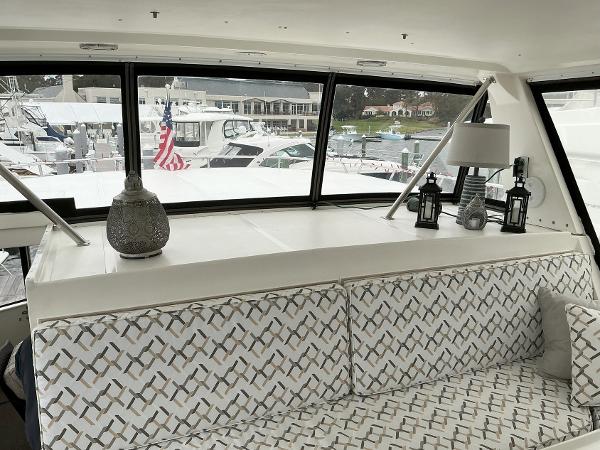 Interior of 2000 Novatec Islander 55 yacht with patterned seating and decorative accents.