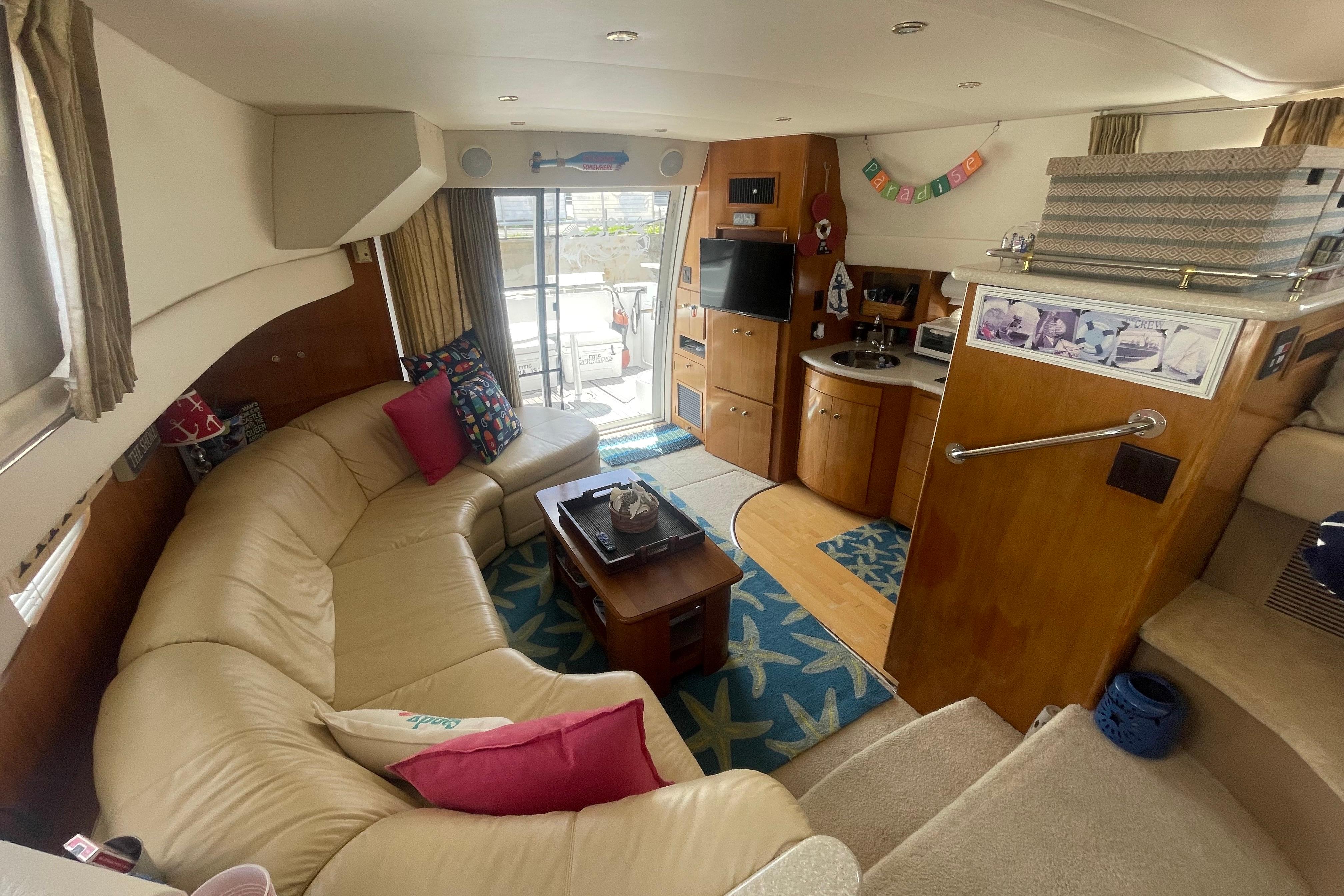 Interior of 2002 Carver 410 Sport Sedan with cozy seating and modern amenities.