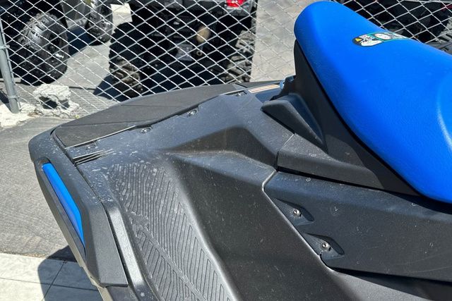 Close-up of a black Yamaha WaveRunner Jetblaster with a blue seat.