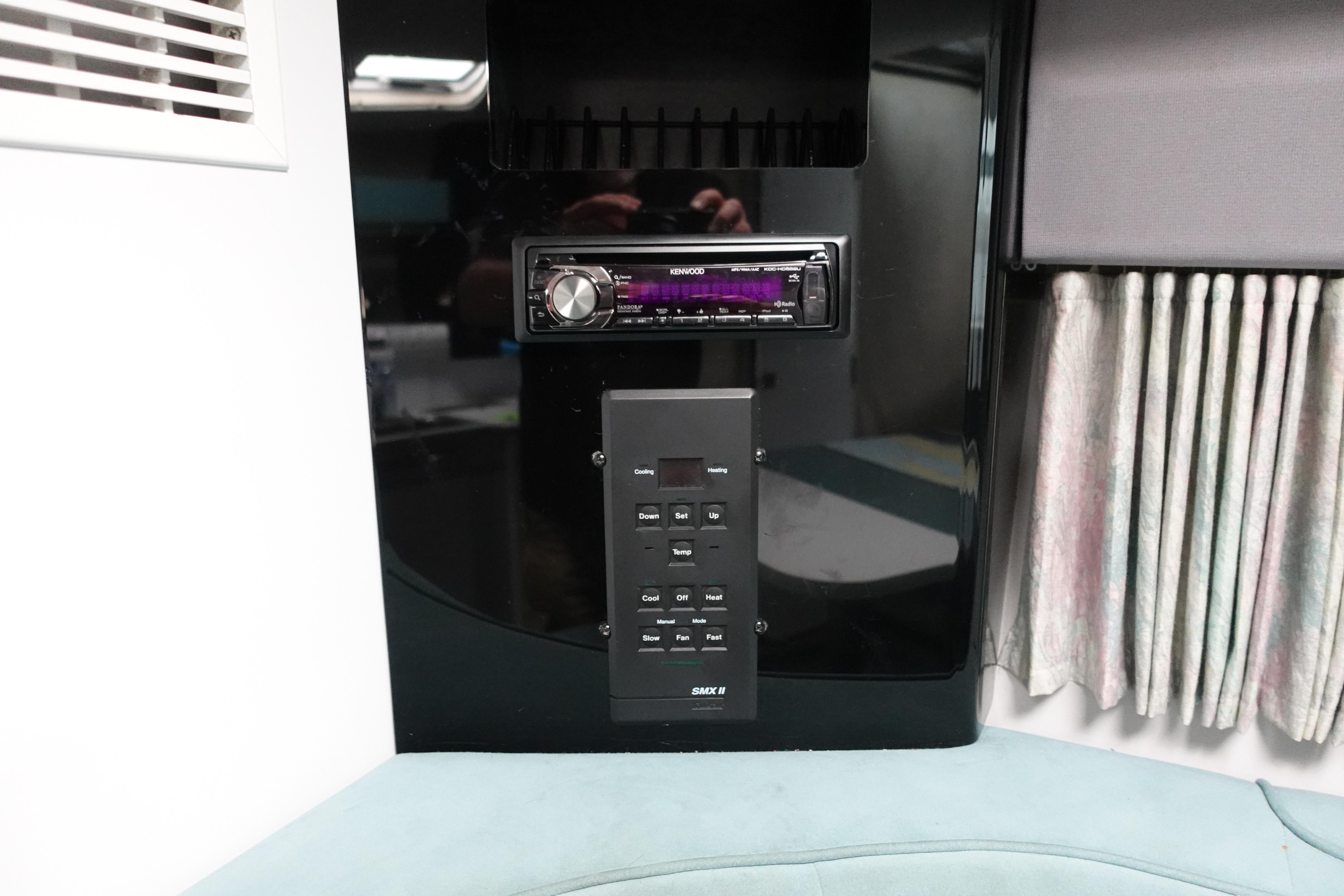 Interior of 1993 Formula 34 Performance Cruiser with stereo and control panel.