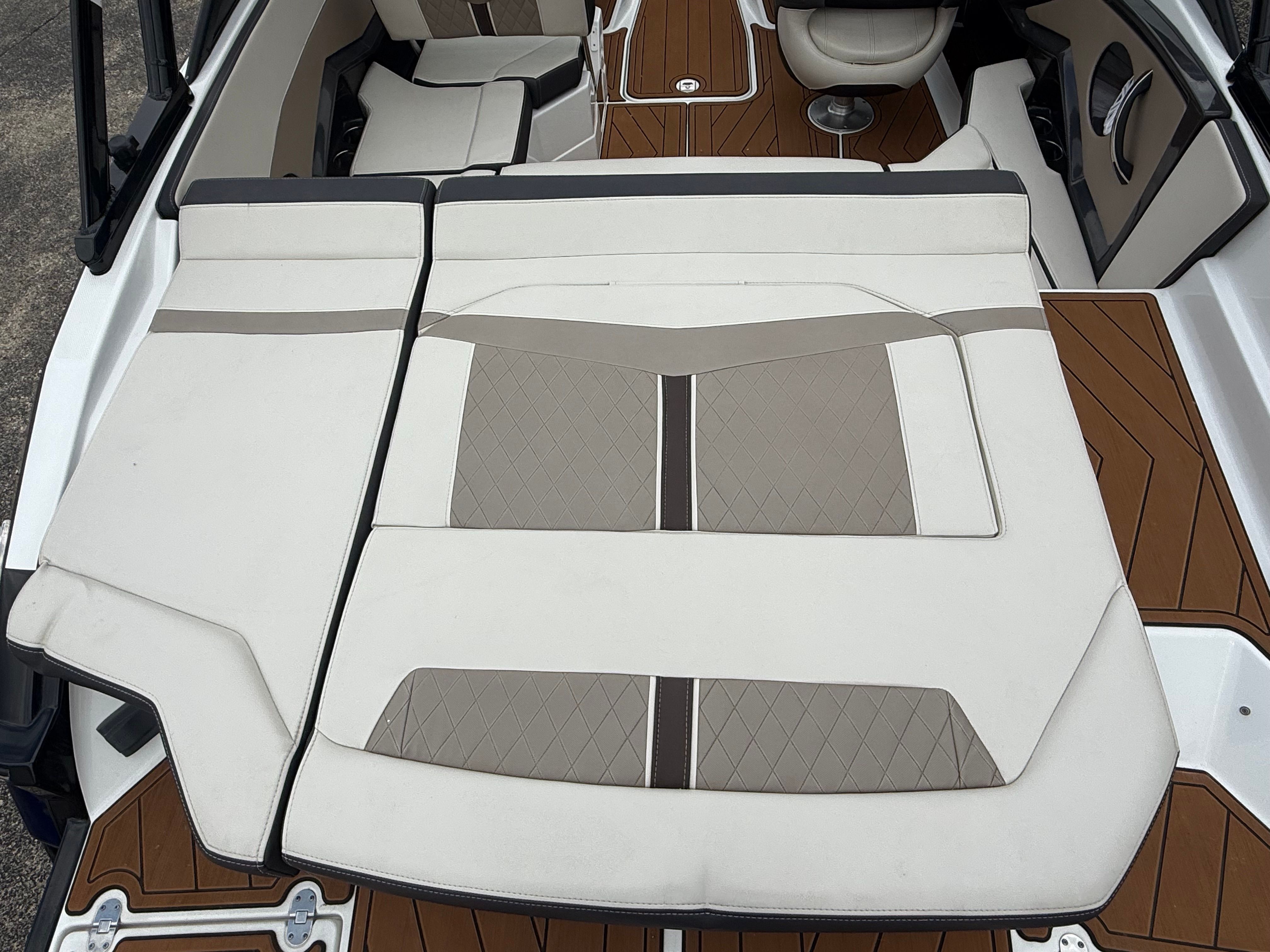 Interior of a 2021 Monterey 218 Super Sport boat with luxurious seating.