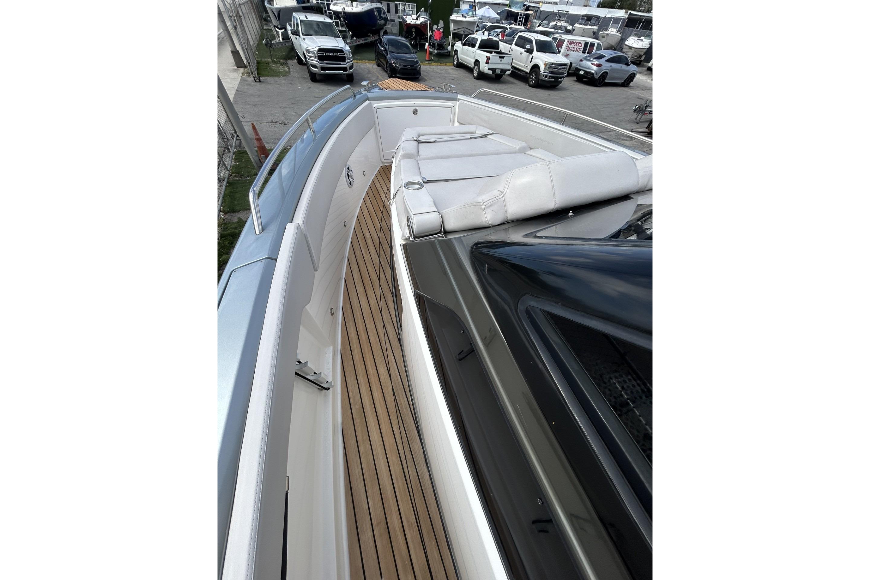 2023 Schaefer V33 yacht with sleek deck and luxurious seating.