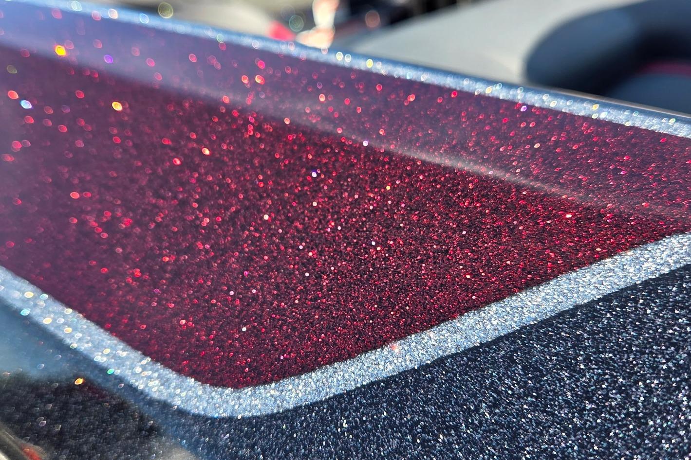 Metallic red and silver glitter detail on 2026 Nitro Z17 boat.
