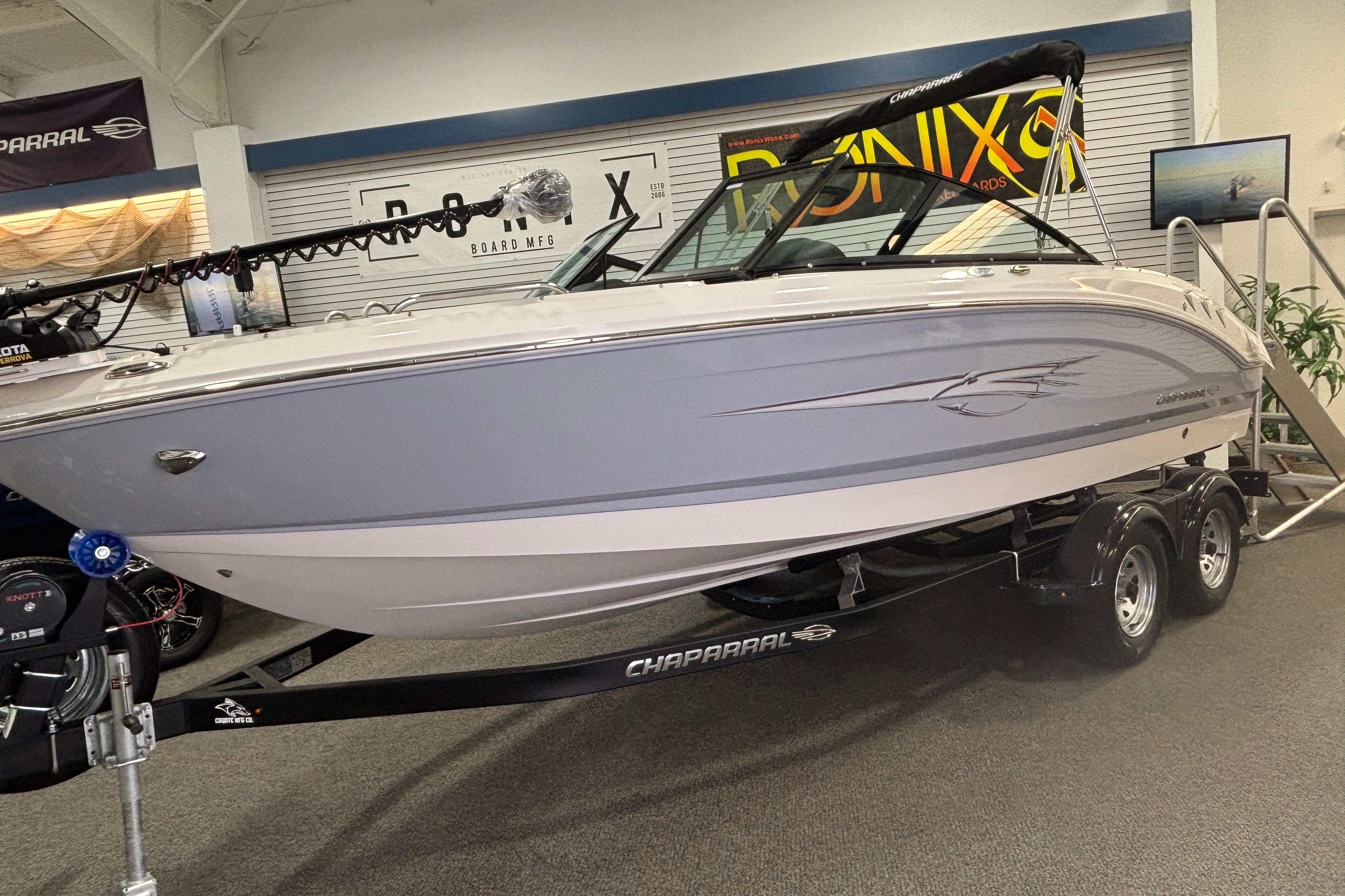 2026 Chaparral 21 SSi Ski & Fish boat in showroom.