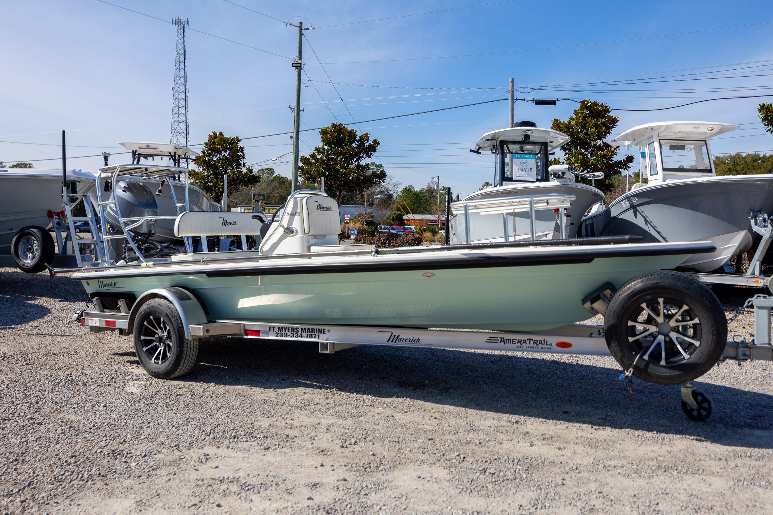 2024 Maverick 17 HPX-S boat on trailer at dealership, surrounded by other boats.