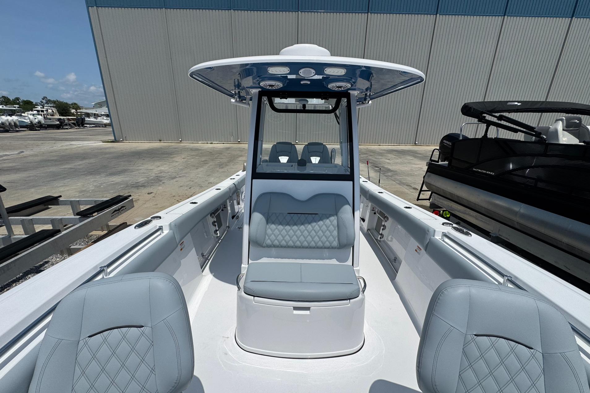 2026 Sportsman Open 262 Center Console boat with sleek seating and modern design.