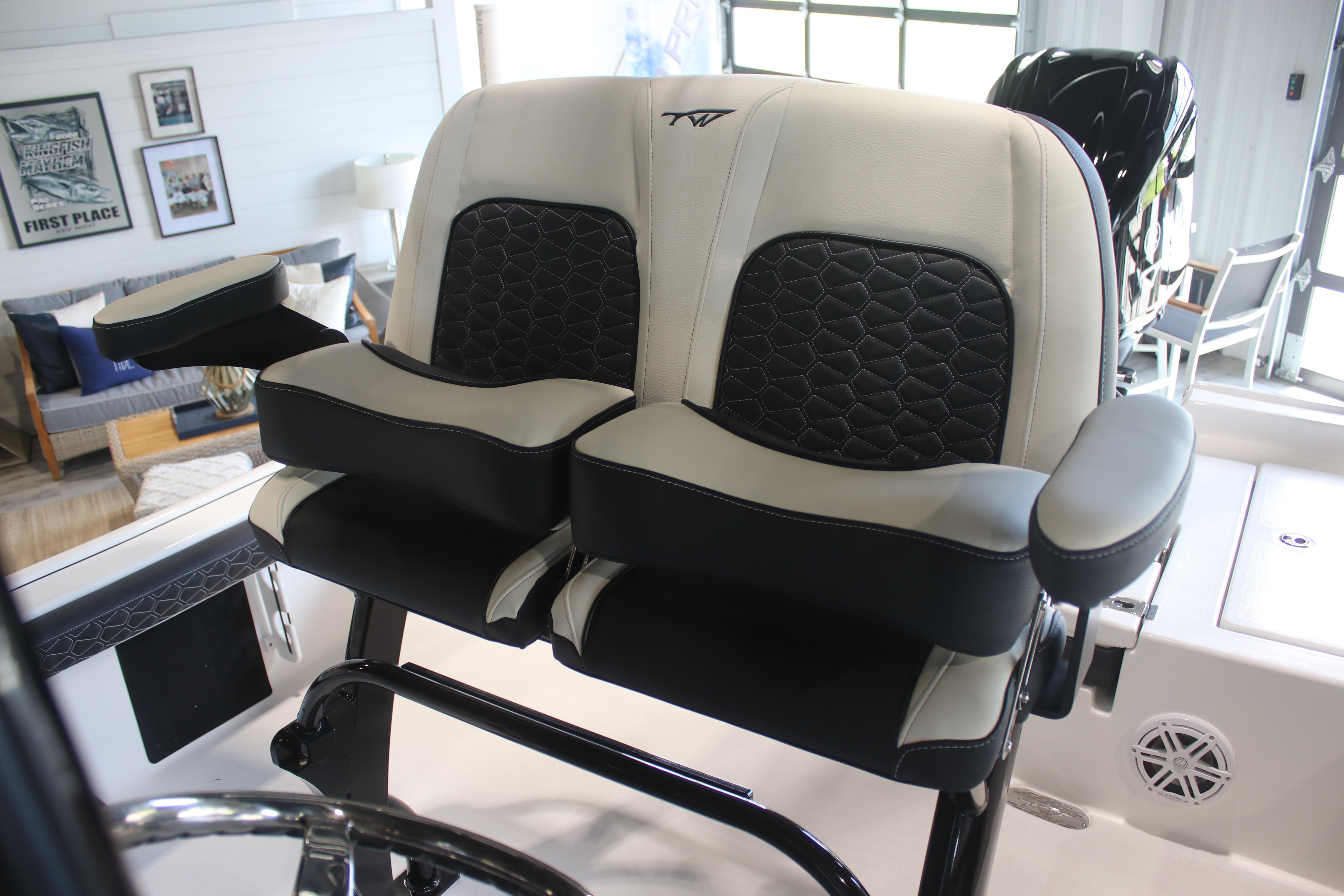 2026 Tidewater 2300 Carolina Bay boat seats with armrests and stylish design.