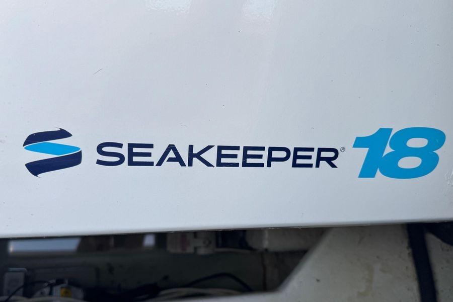 Seakeeper 18 logo on 2002 Viking 61 Enclosed Bridge yacht.