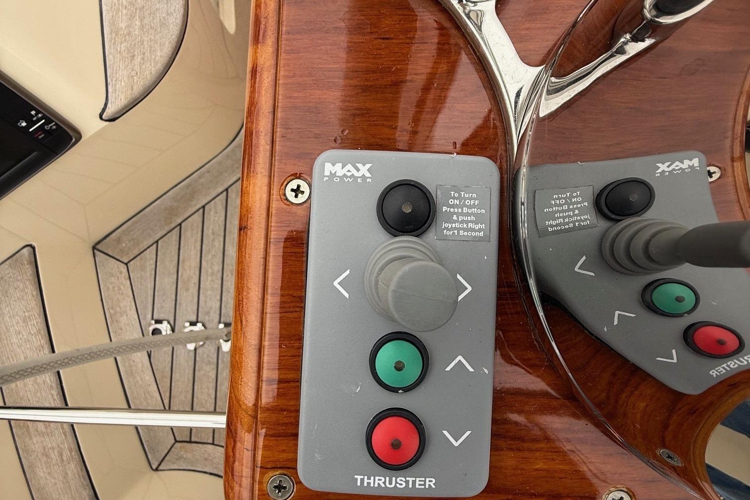 Hinckley DS 42 2015 boat thruster control panel with joystick and buttons.