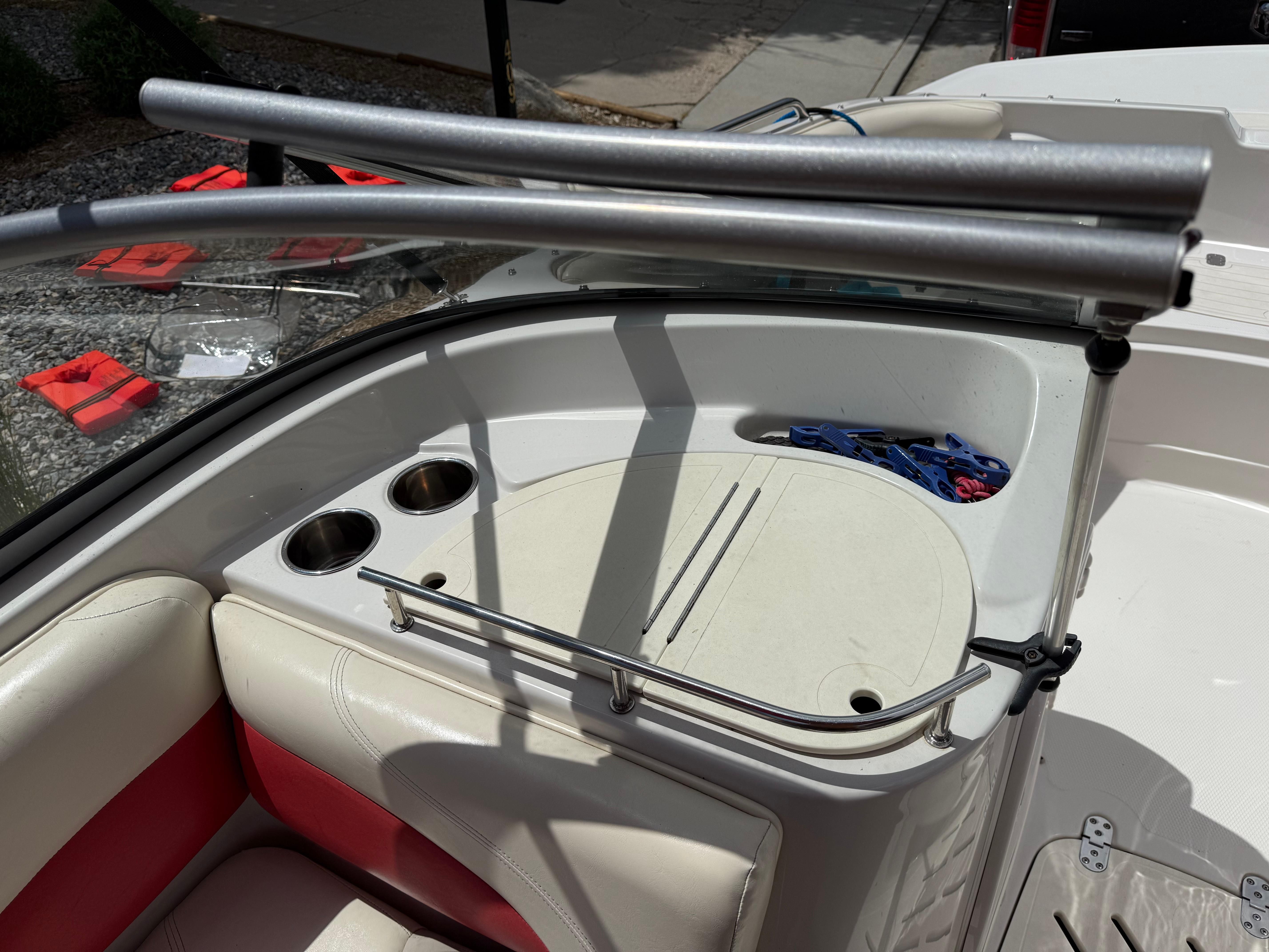 Interior of a 2011 Tahoe 216 WT boat with cup holders.
