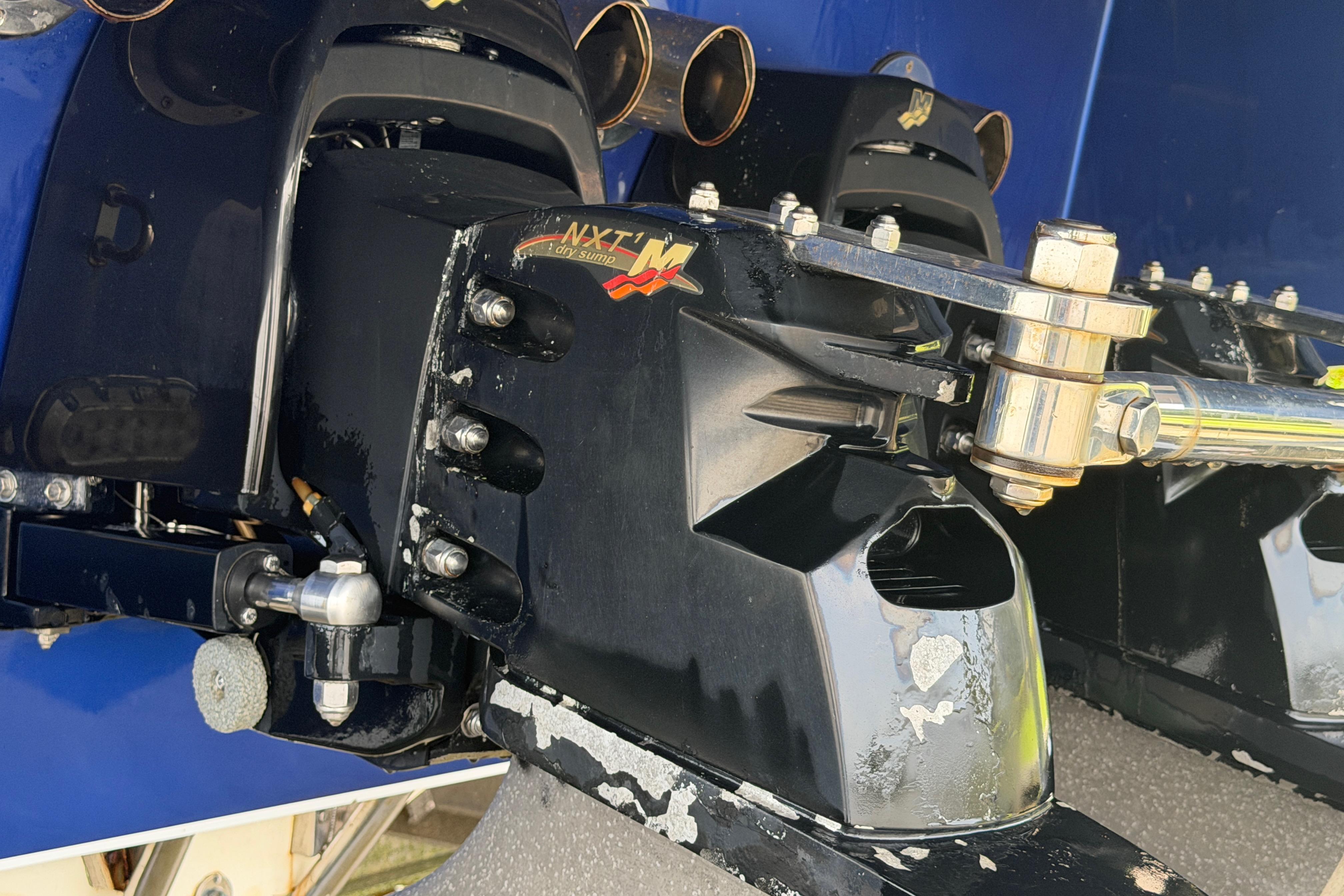 Close-up of 2013 Nor-Tech 477 SPX Vee Bottom boat engine components.