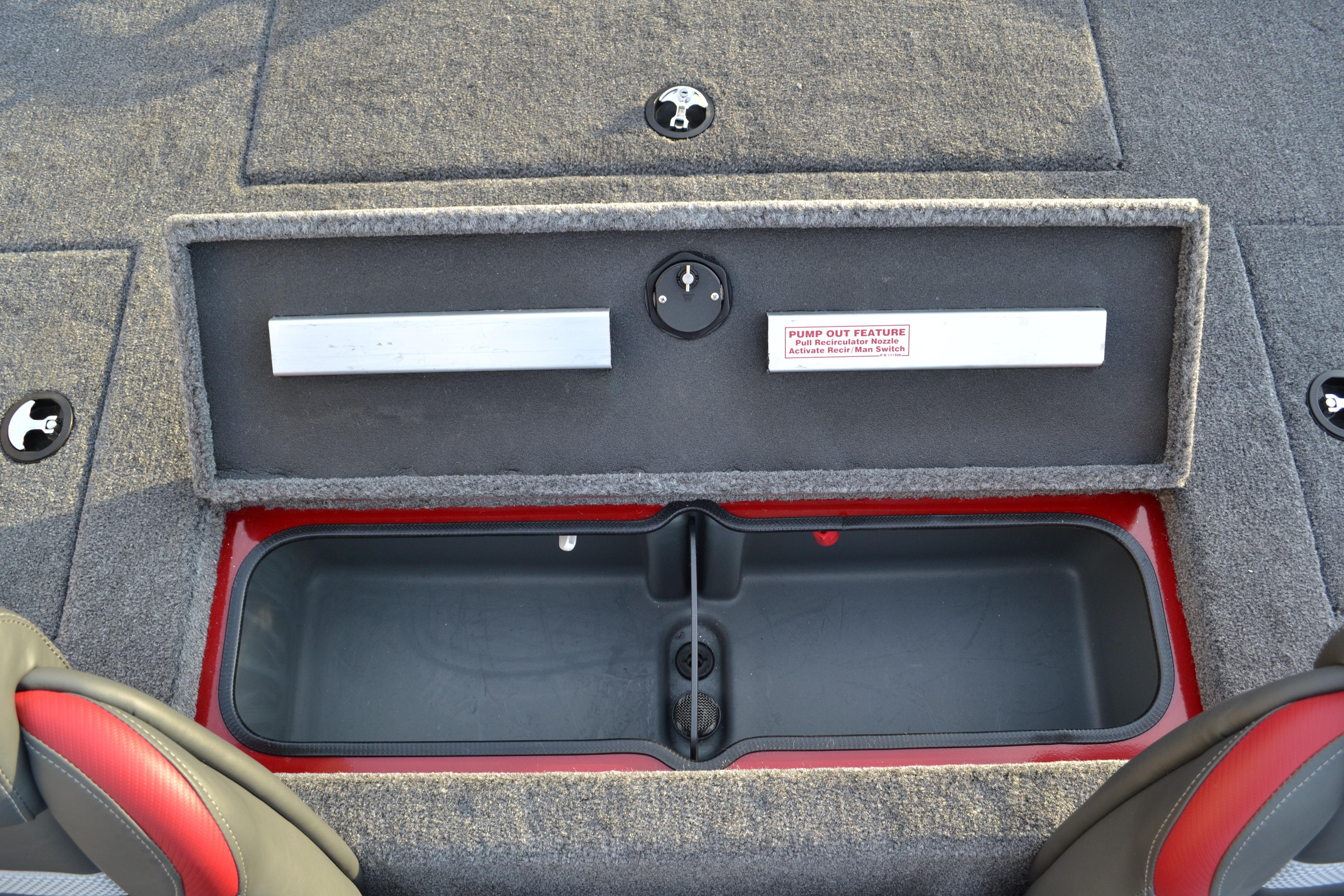 2026 Ranger RT188 boat storage compartment with pump-out feature, gray carpeted interior.