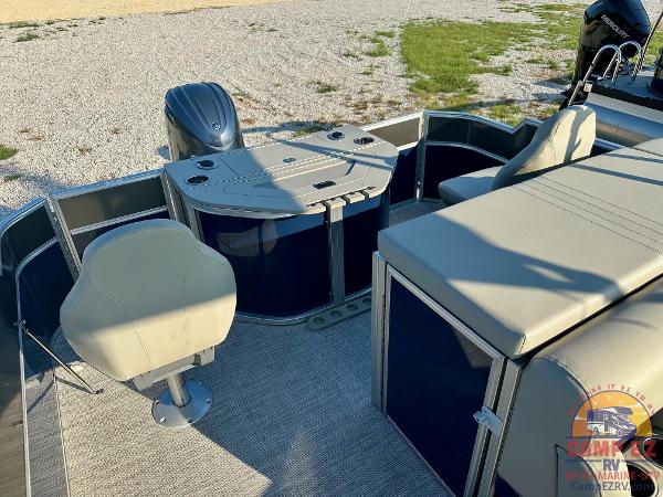 2025 South Bay 224FCR LE pontoon boat interior with seating and helm station.