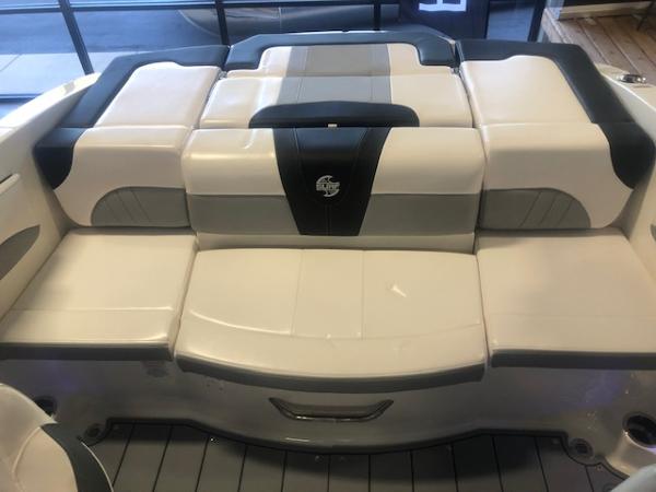 2023 Chaparral 21 Surf boat interior seating, featuring sleek, modern design and comfortable upholstery.