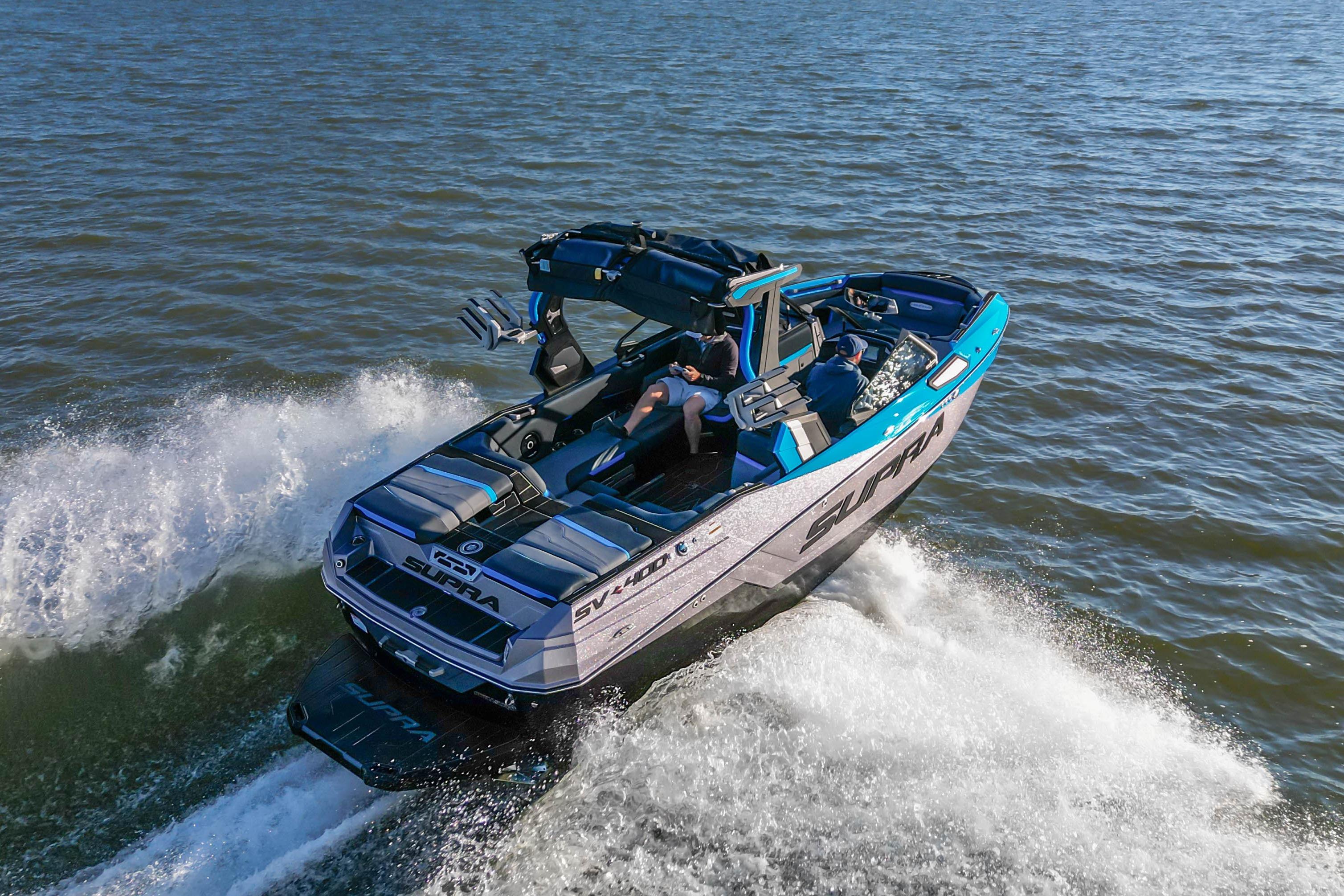 2024 Supra SV 400 boat cruising on open water, showcasing sleek design and performance.