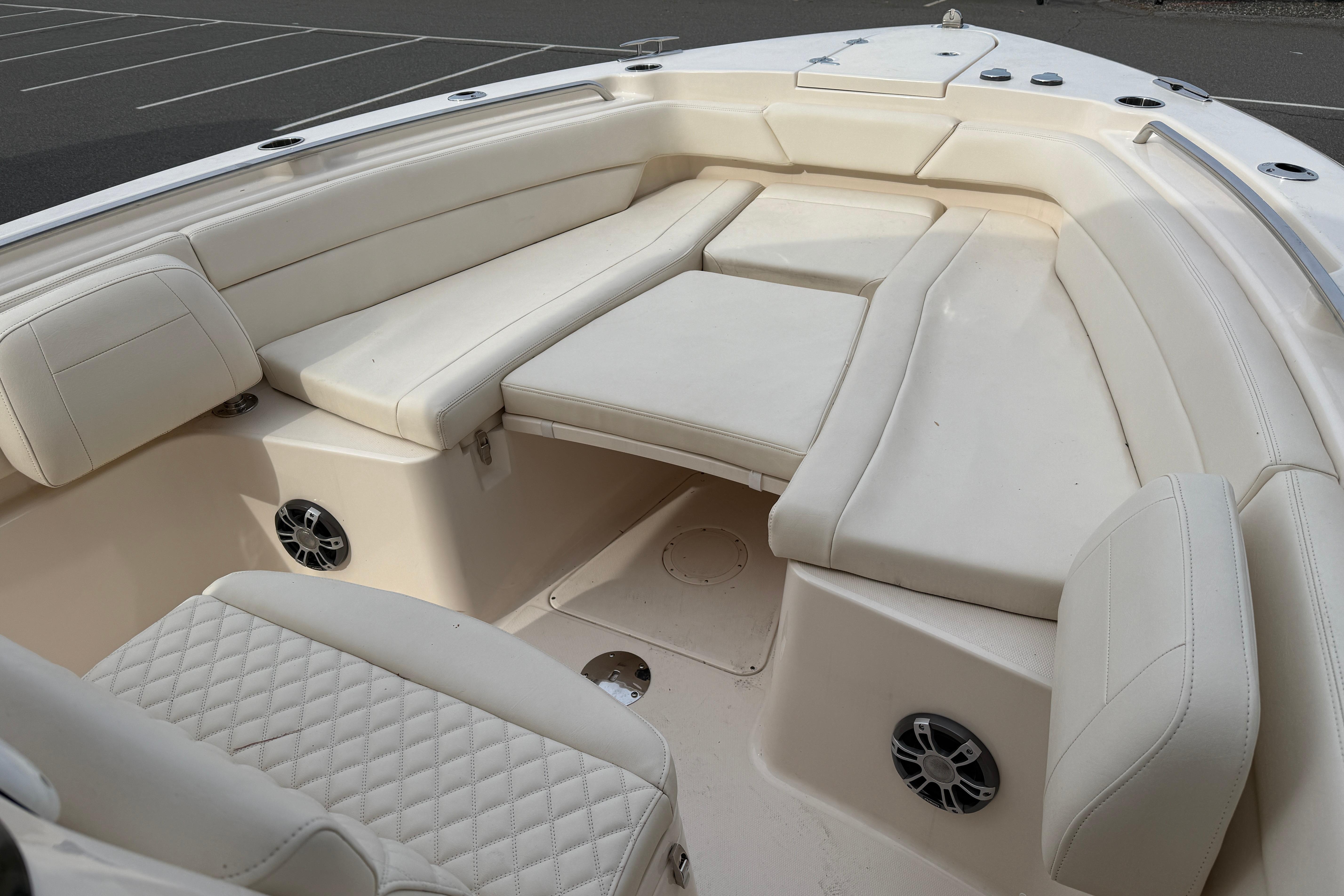 2024 Grady-White Canyon 271 boat interior with luxurious seating and modern design.