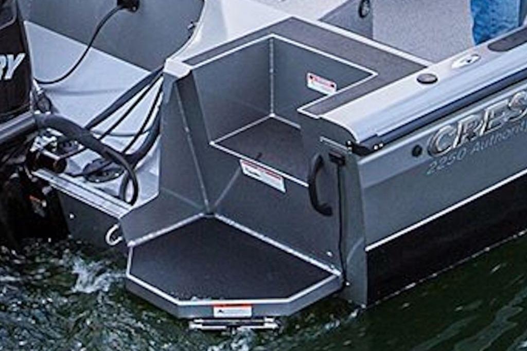 2026 Crestliner 2050 Authority boat stern with step platform and motor.