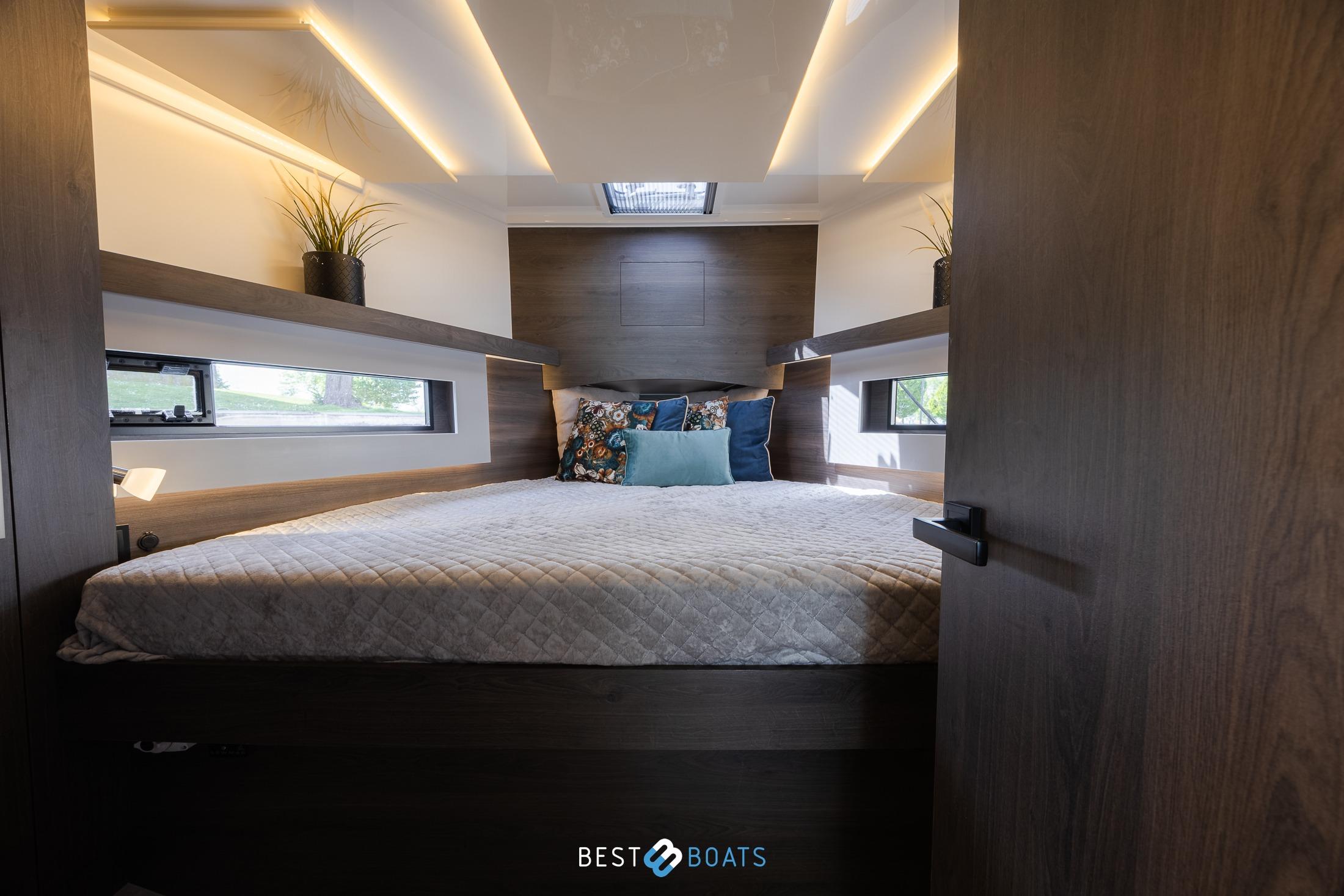 Luxurious bedroom interior of 2023 Cobra Yachts Futura 36 Premium Fly with modern design.