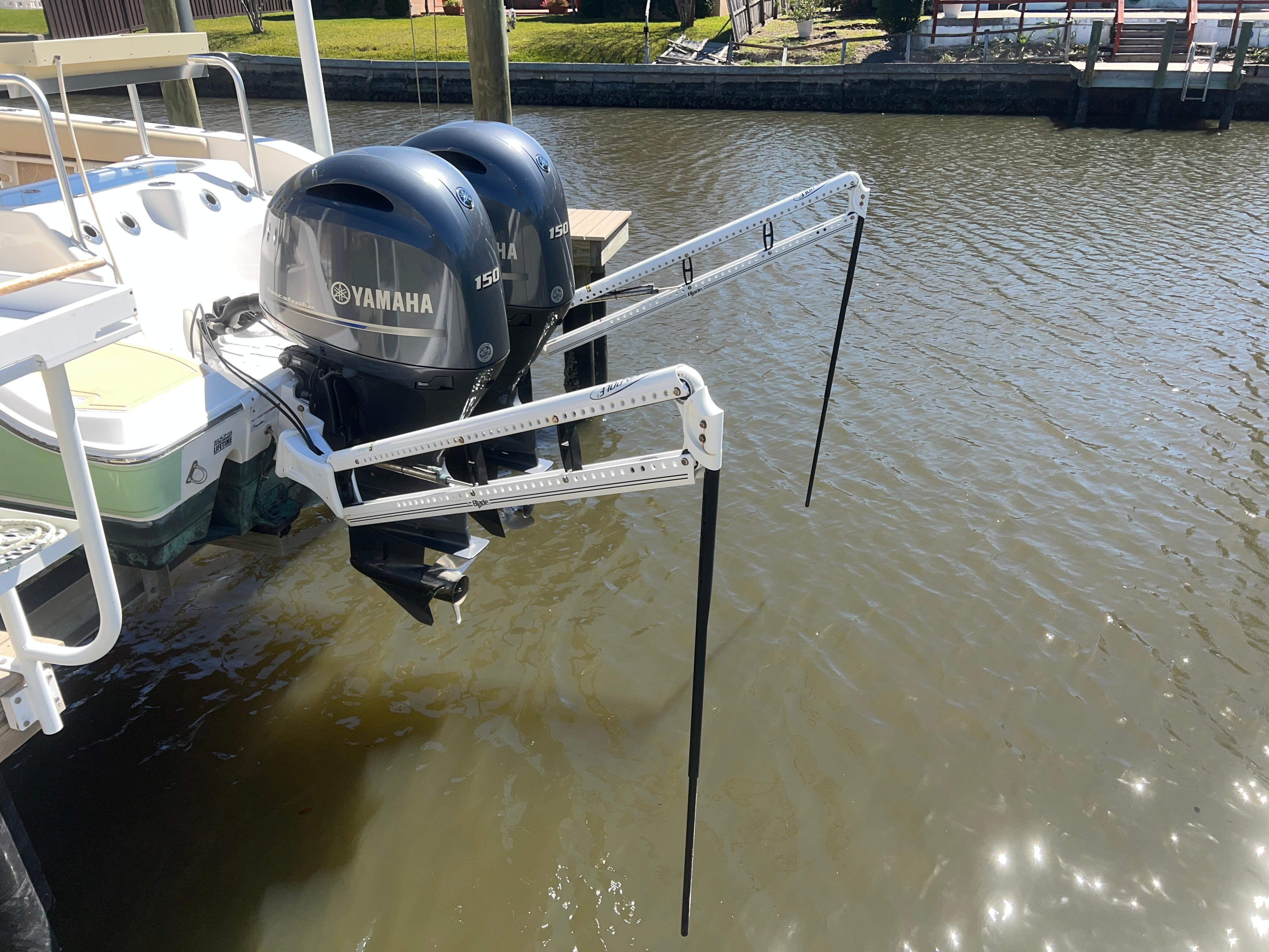 Sea Fox 266 Commander 2016 with dual Yamaha outboard motors on a calm waterway.