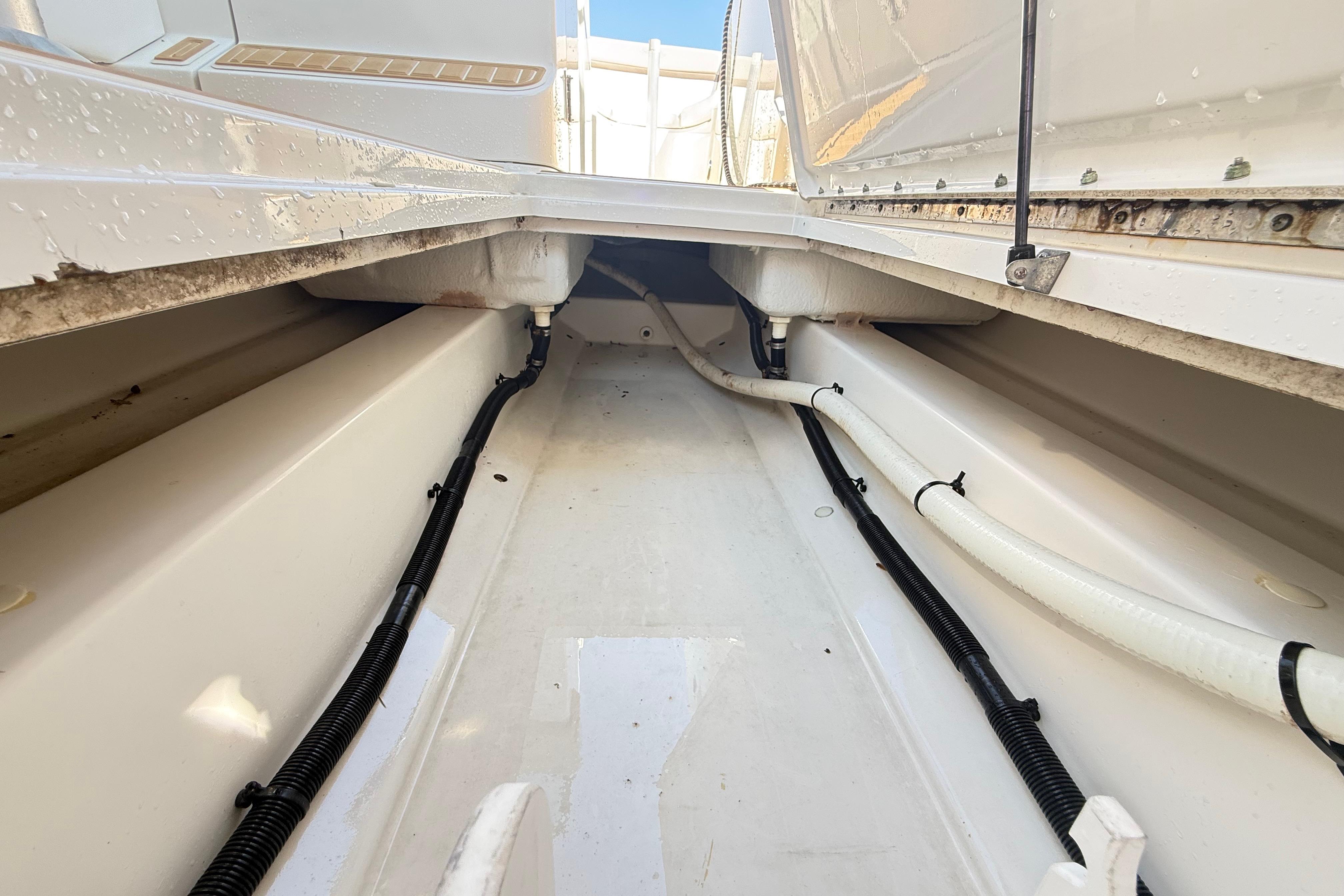 Bilge area of a 2011 Sea Ray 270 SLX boat, showing clean interior and wiring.