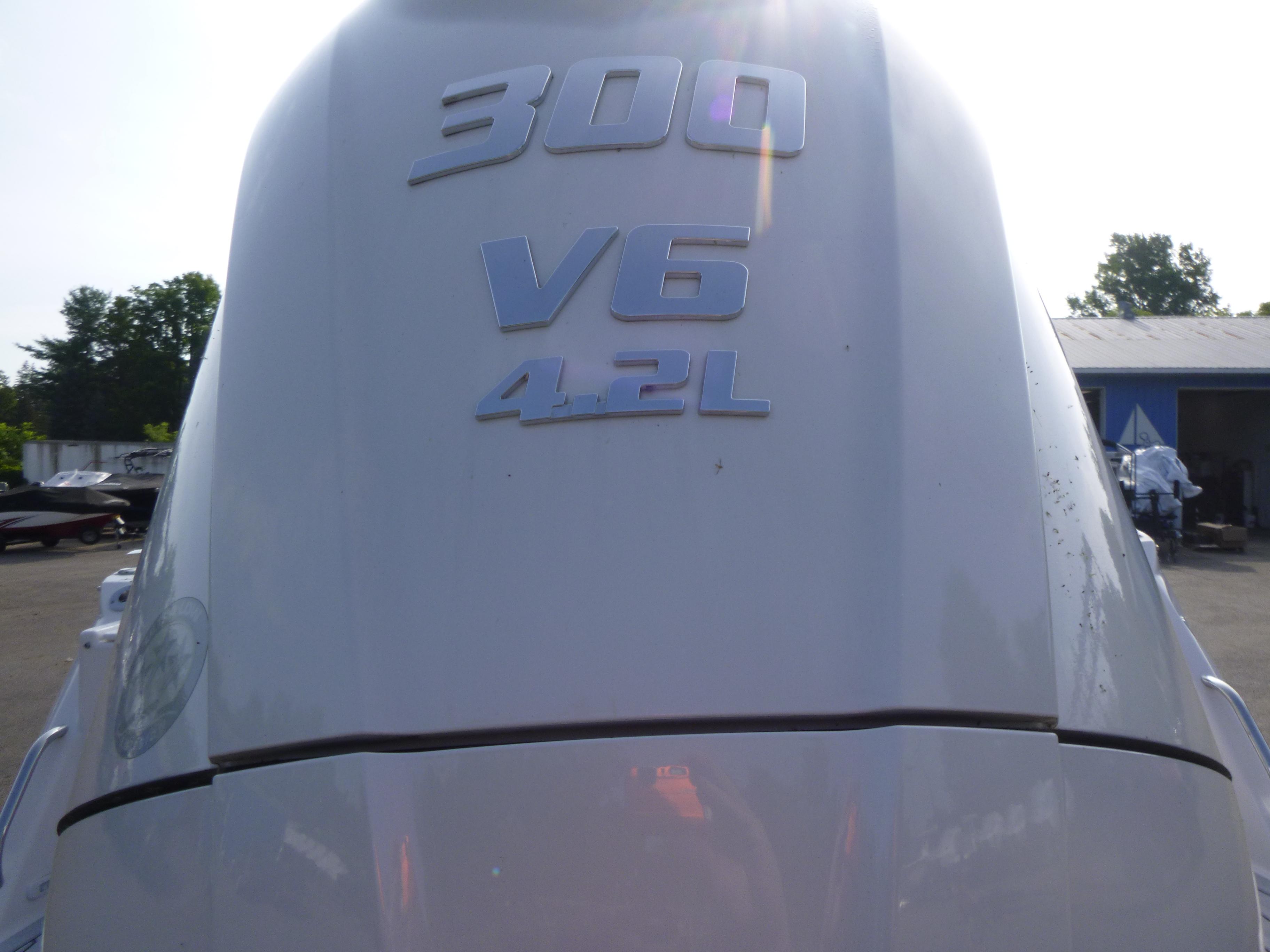 Outboard motor with "300 V6 4.2L" marking on a 2025 Solara S-250 CW.
