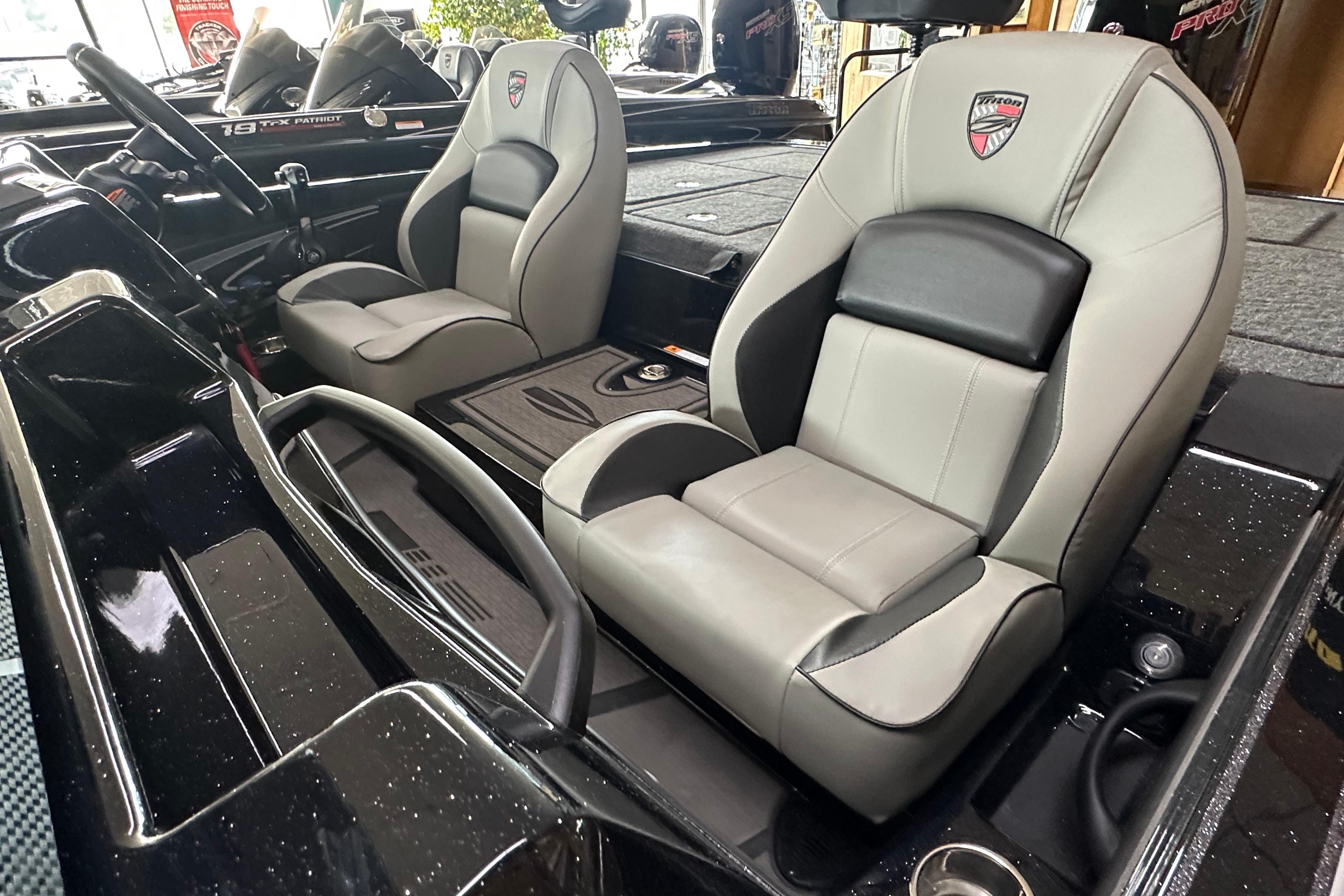 2024 Triton 20XP Patriot boat interior with sleek, modern seating and dashboard design.