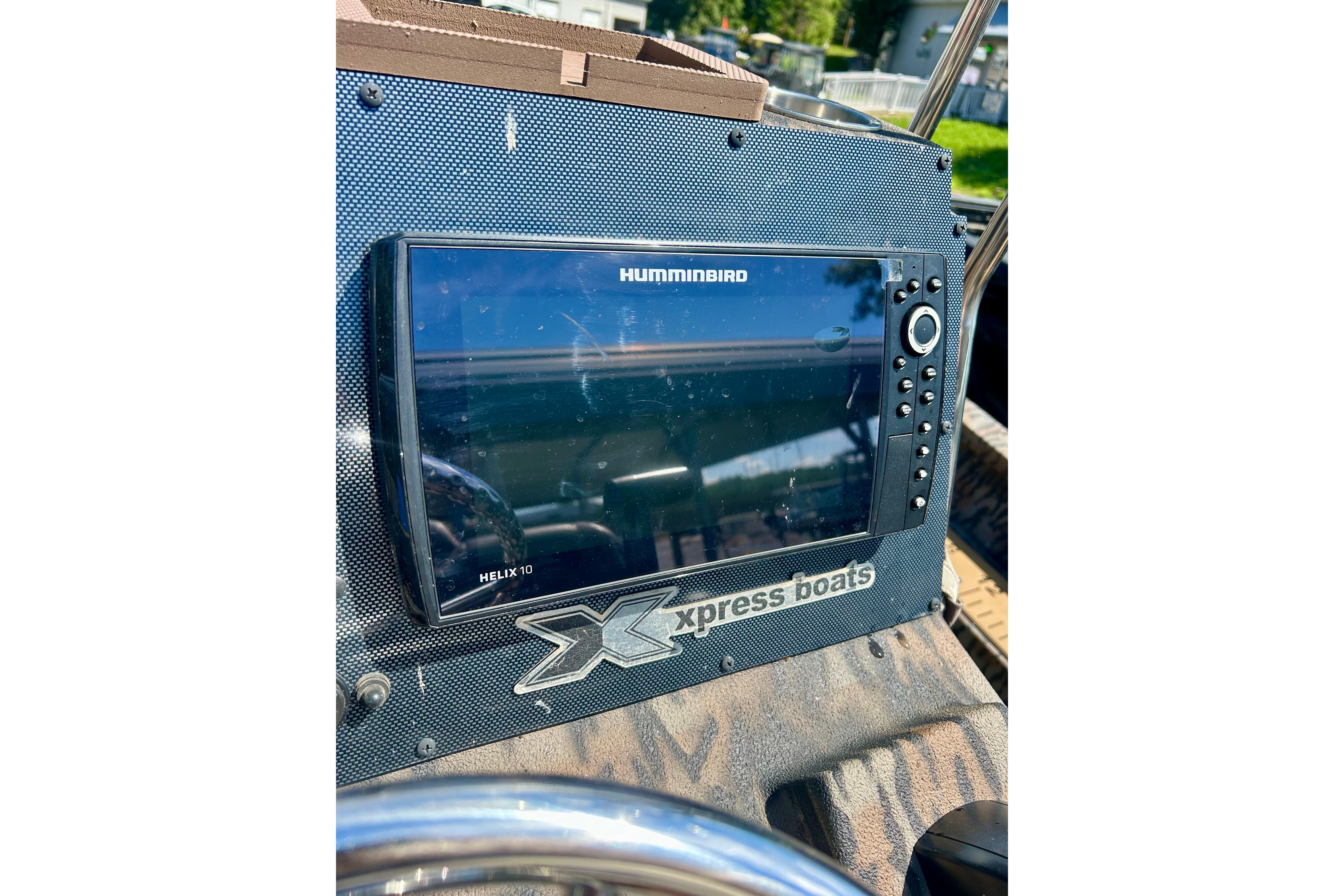 Helix 10 fish finder on 2025 Xpress H22B Bay boat dashboard.