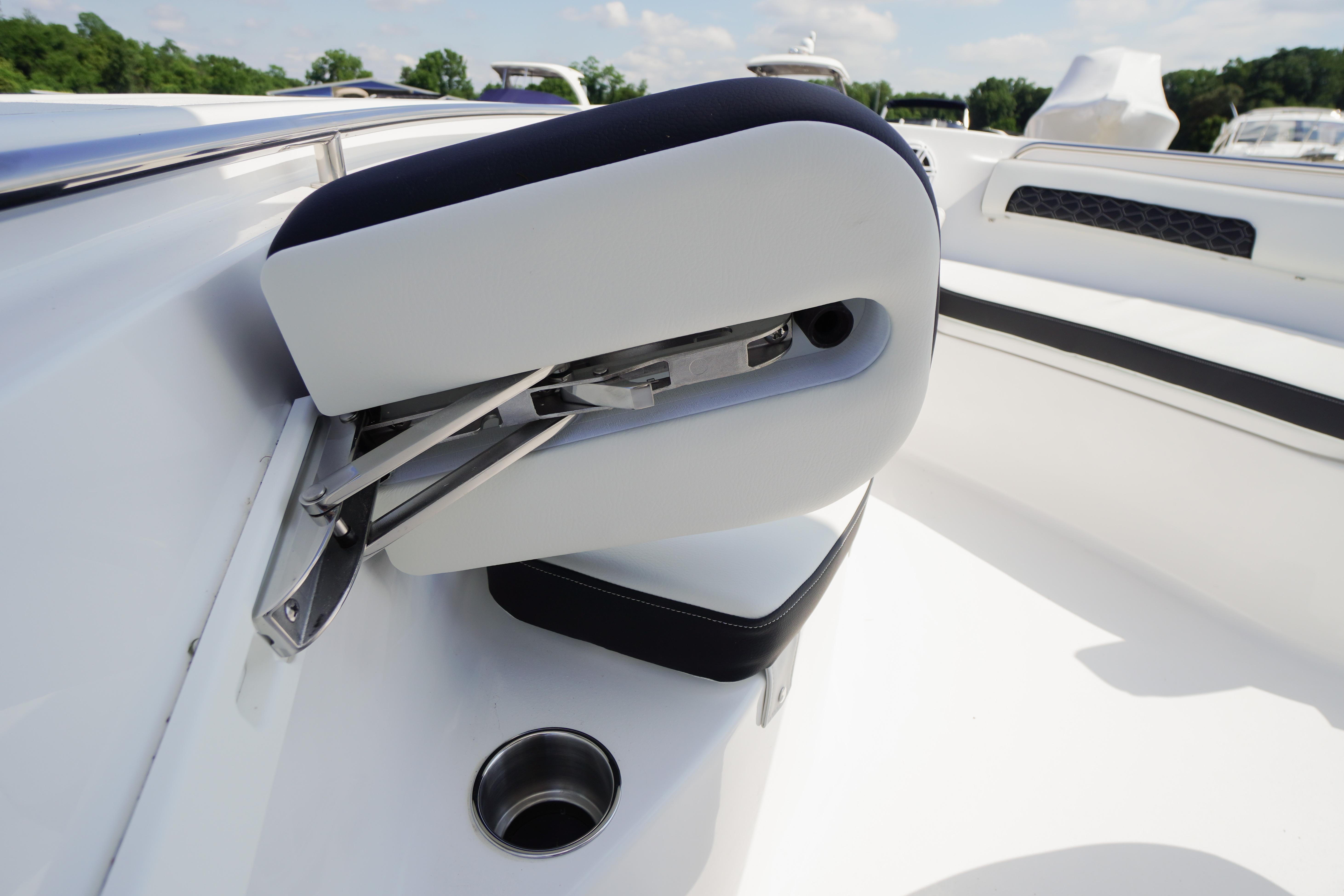 2026 Tidewater 220 CC Adventure boat seat with stainless steel hardware and cup holder.