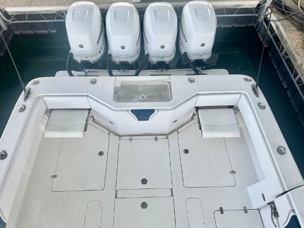 2008 SeaVee 390B boat with four powerful outboard engines, spacious deck layout.