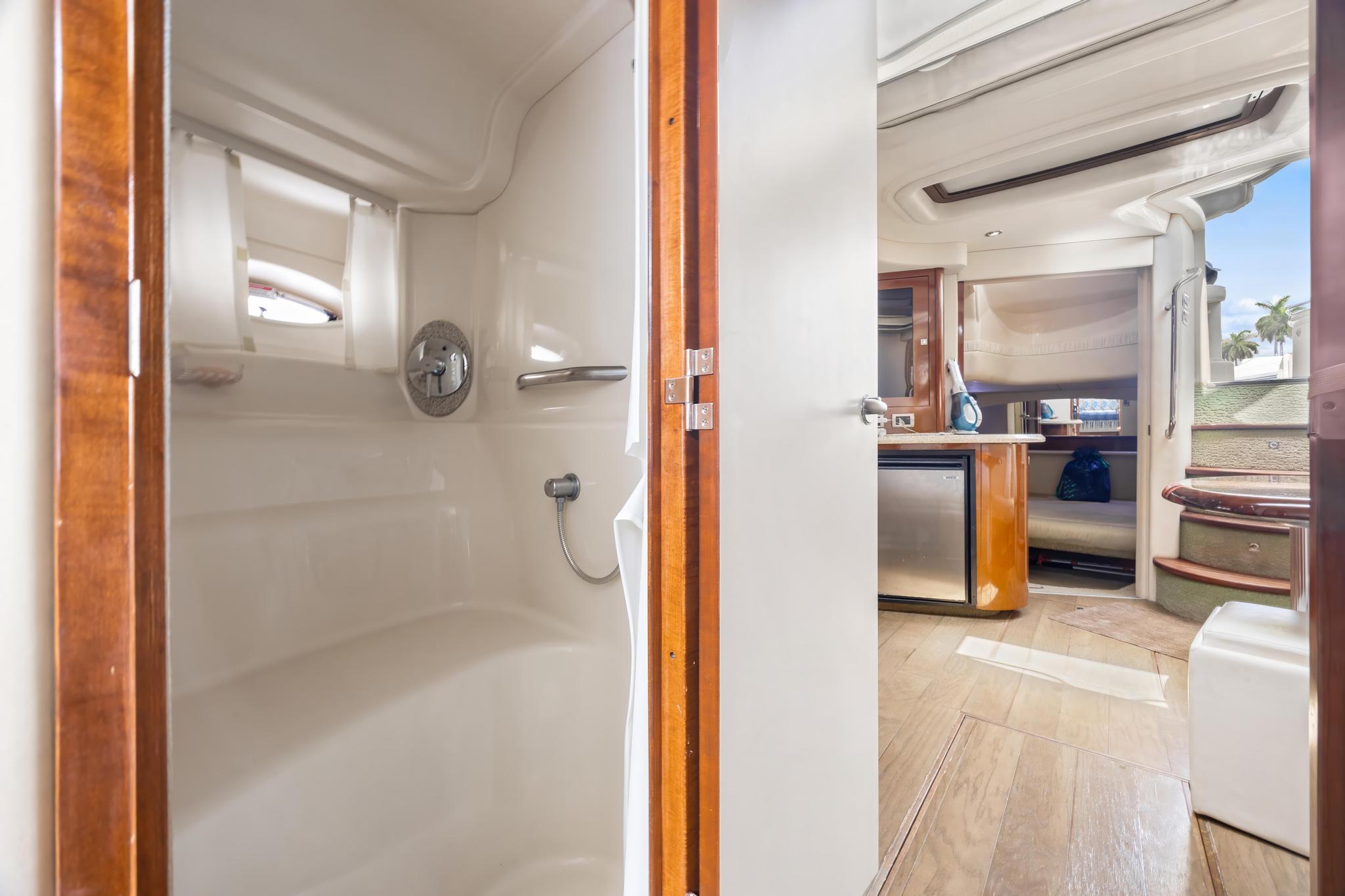 2008 Sea Ray 44 Sundancer interior with shower and cabin view.